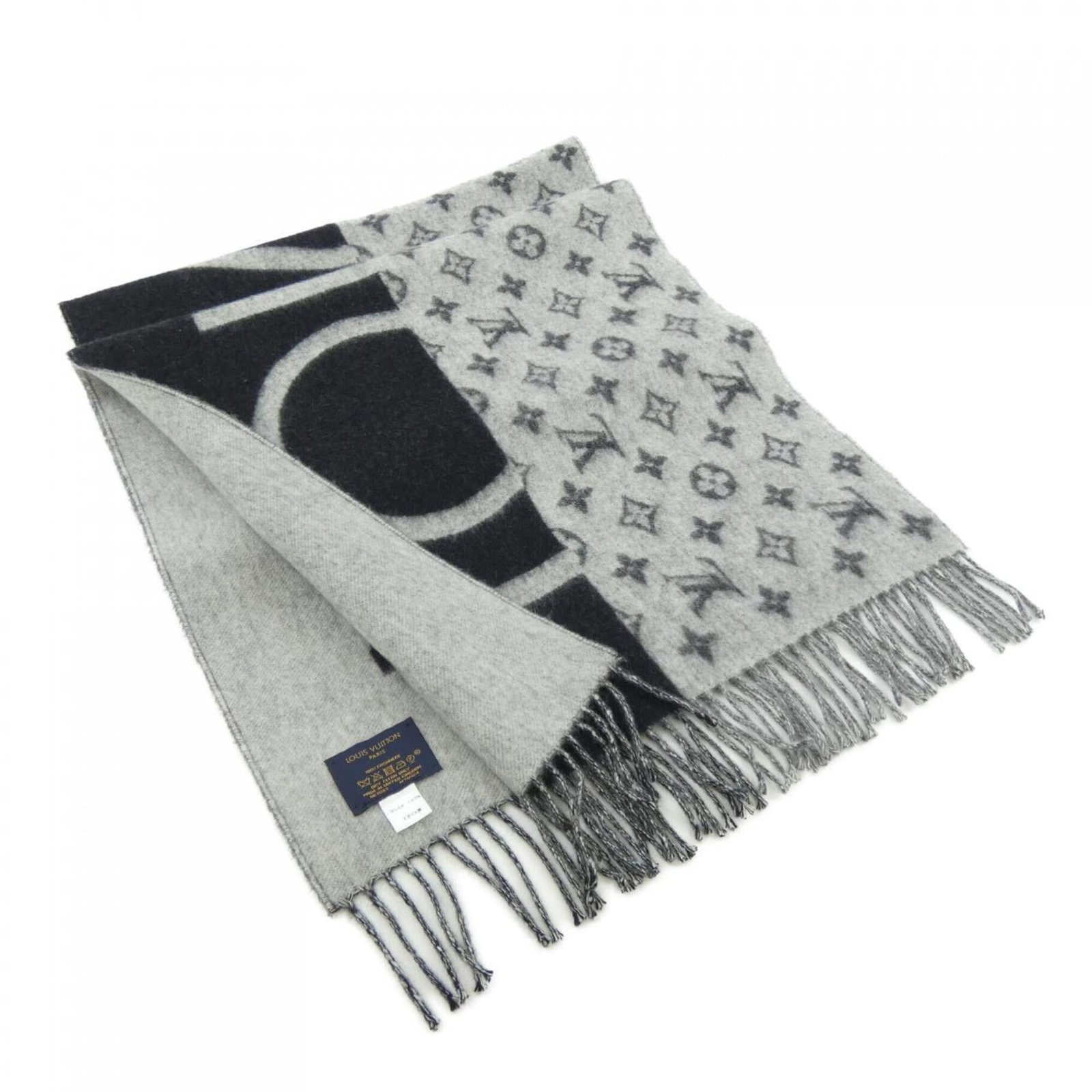 Louis Vuitton Stole Cashmere: Louis Vuitton Stole Cashmere Cashmere stole from Louis Vuitton, measuring 1.88m x 44cm in black and gray hues, features the iconic brand's signature style with a luxurious cashmere material. The stole