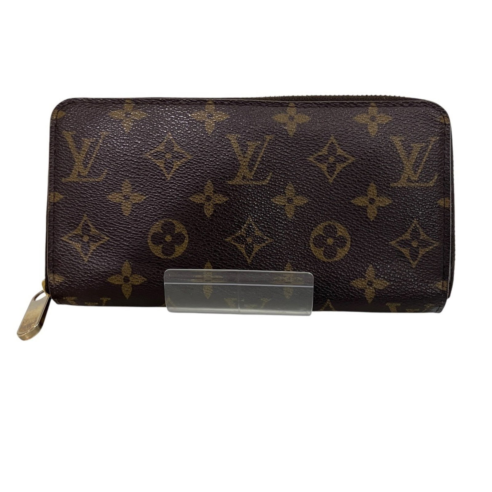 Louis Vuitton bi fold monogram wallet: Louis Vuitton bi fold monogram wallet Brown Louis Vuitton bi-fold wallet with iconic monogram pattern, measuring 10.5cm x 19.5cm x 2.5cm. This long wallet features a classic design and signature LV st