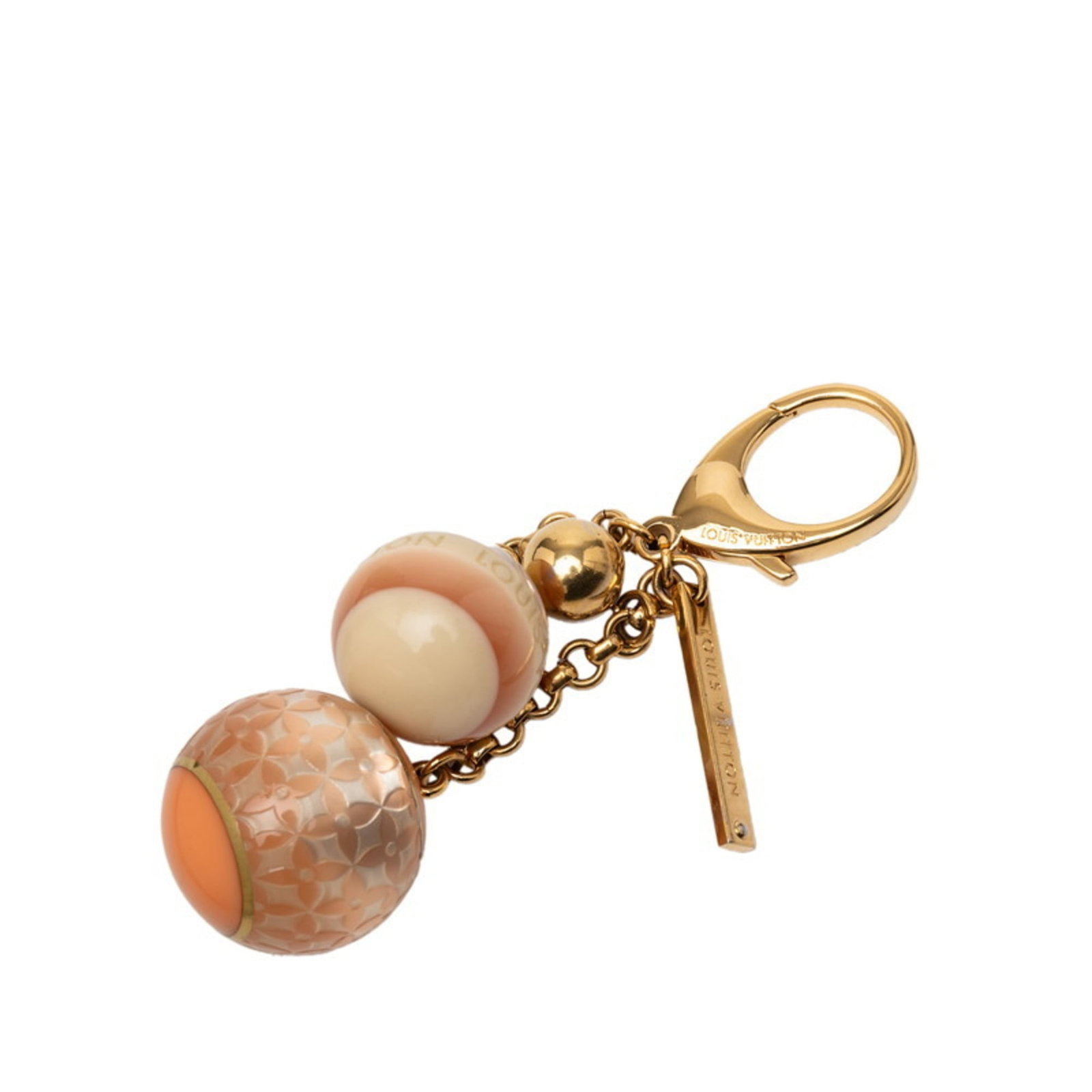 Keyring Resin by Louis Vuitton: Keyring Resin by Louis Vuitton Resin keyring with a distinctive Louis Vuitton design, available in beige, ivory, and pink hues. The resin material adds a touch of modern elegance to this iconic access