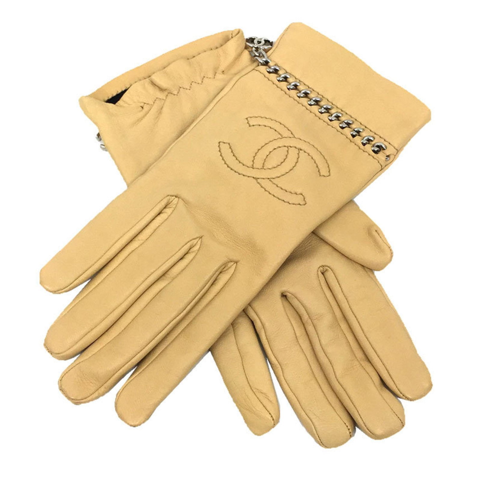 Chanel Short Gloves Leather Silk: Chanel Short Gloves Leather Silk Chanel Short Gloves Leather Silk - A luxurious pair of short gloves crafted from high-quality leather and silk, presented in a sleek beige color. The elegant design