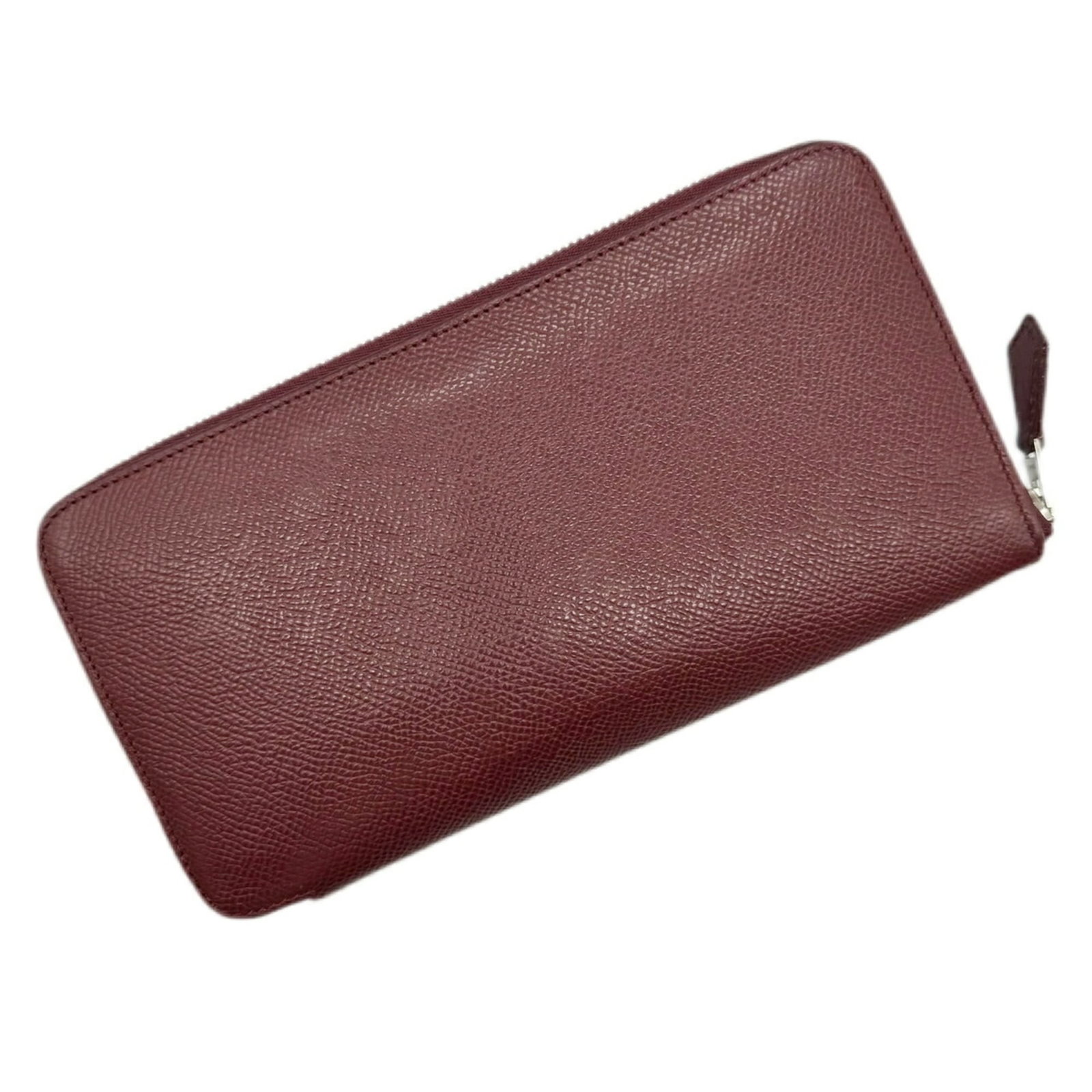 Epsom Leather Bi Fold Wallet Hermes: Epsom Leather Bi Fold Wallet Hermes Epsom leather bi-fold wallet from the Hermes brand, featuring a classic design with a signature touch. Made from high-quality Epsom leather in a rich Rouge color, t