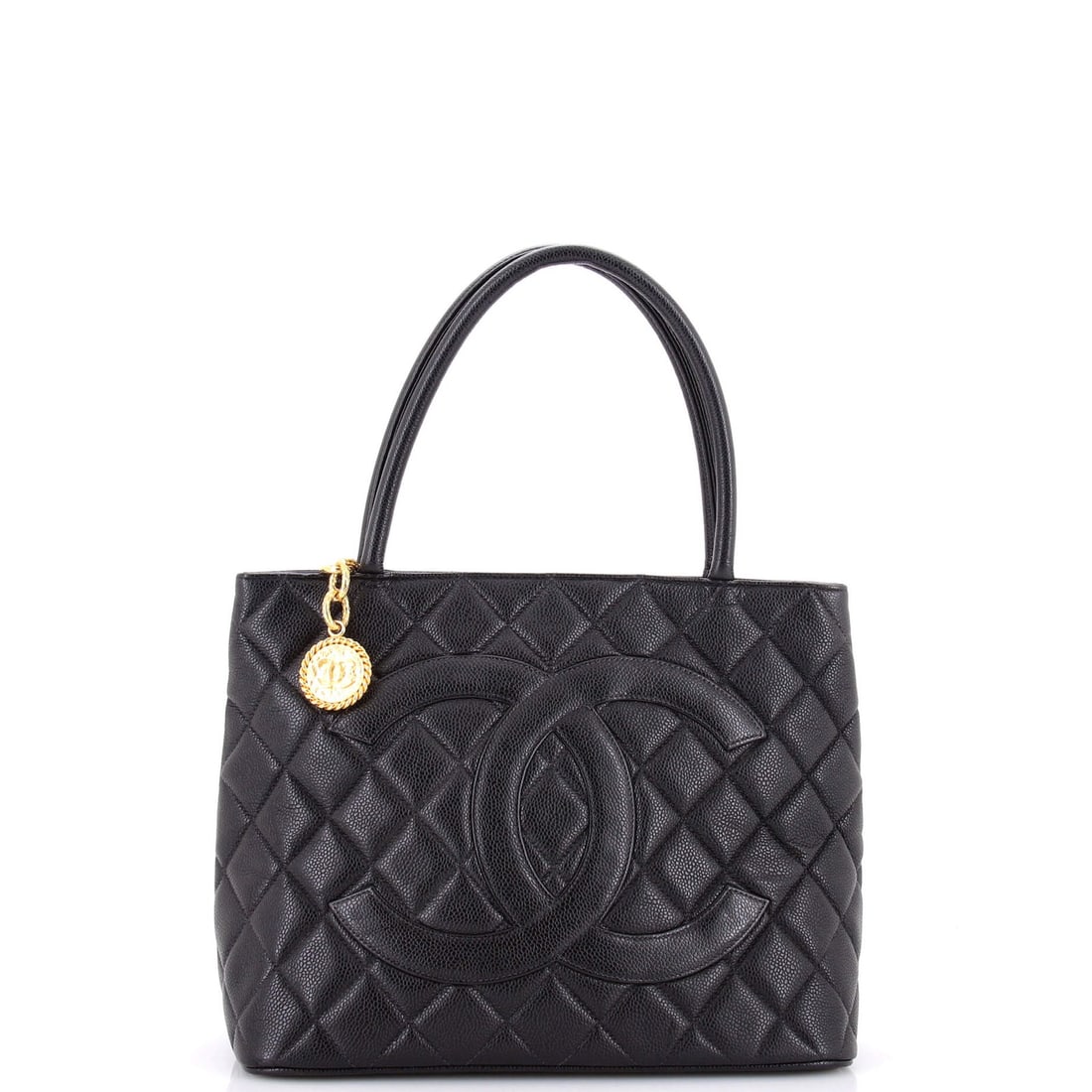 Caviar Quilted Tote Chanel Medallion: Caviar Quilted Tote Chanel Medallion Black quilted caviar leather Chanel medallion tote with gold hardware, featuring scuffs and minor creases on the exterior. The interior boasts black leather and a