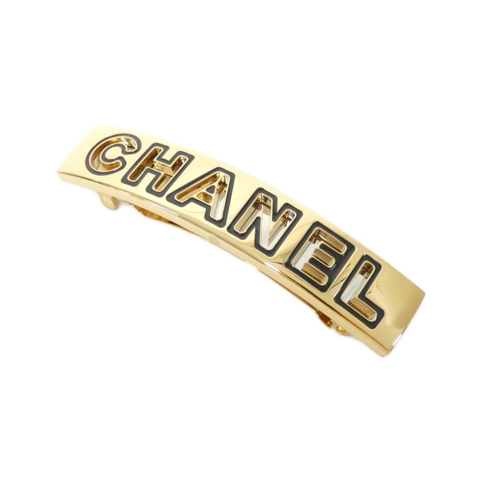Barrette of Chanel: Barrette of Chanel This black and gold Chanel barrette boasts sleek, sophisticated design with precise dimensions at 8.5cm x 1.7cm. Its compact size makes it a stylish accessory for everyday wear. The