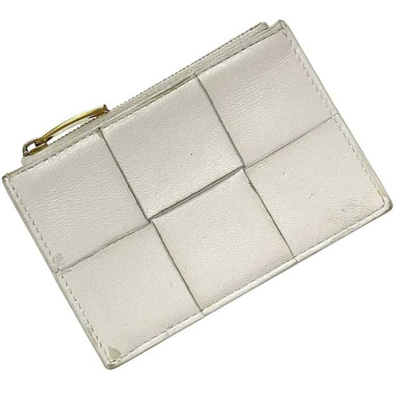 Leather Coin Case Coin Purse Bottega Veneta: Leather Coin Case Coin Purse Bottega Veneta The Bottega Veneta Leather Coin Case is a sleek and elegant coin purse made from high-quality white leather. Measuring 8cm x 12cm x 3.5cm, it comes with a d