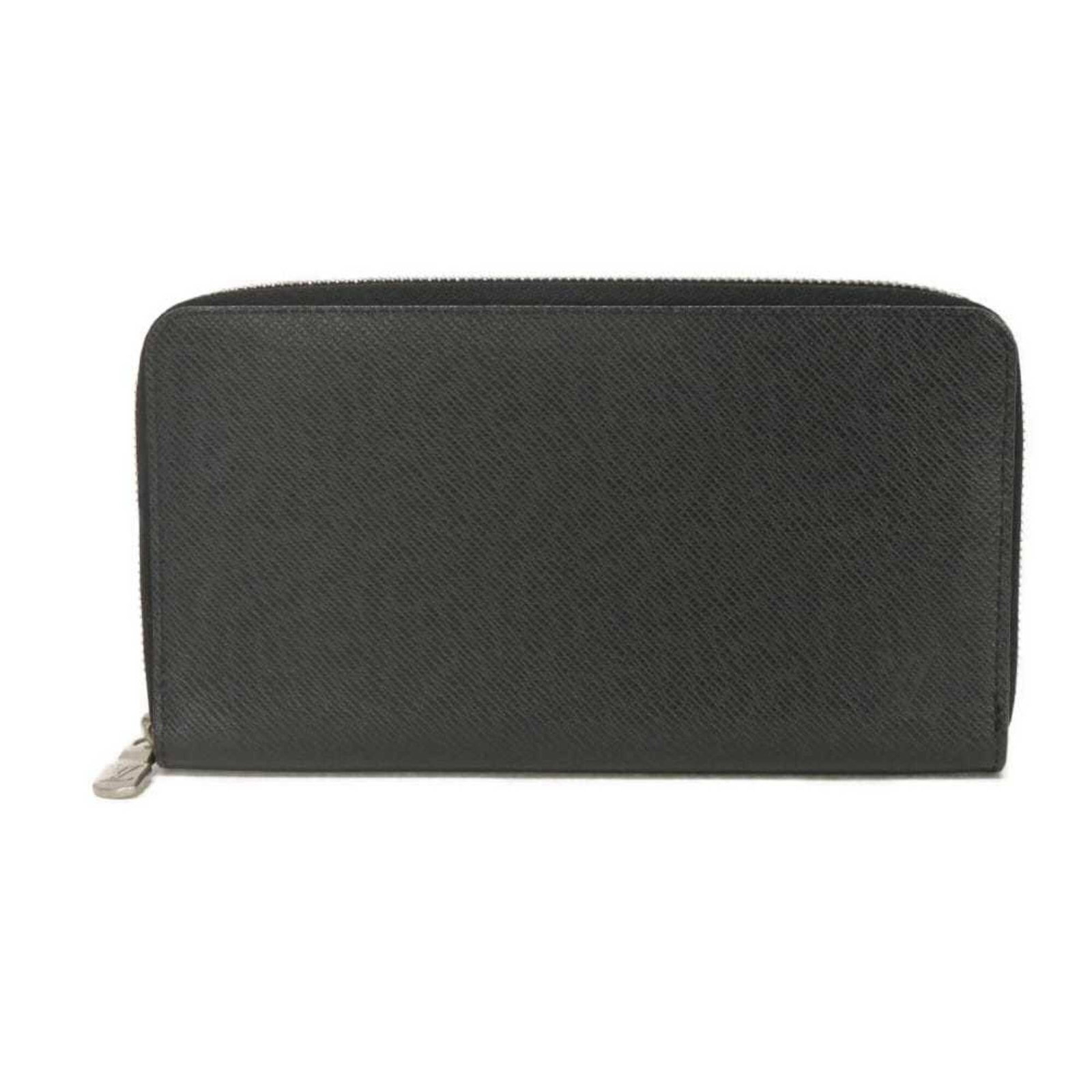 Long Wallet Bi Fold Leather Taiga Louis Vuitton: Long Wallet Bi Fold Leather Taiga Louis Vuitton Taiga Long Wallet Bi Fold Leather Louis Vuitton features Taiga leather in black, noir color, with RFID protection on the body. Measuring 11.5cm x 21cm x