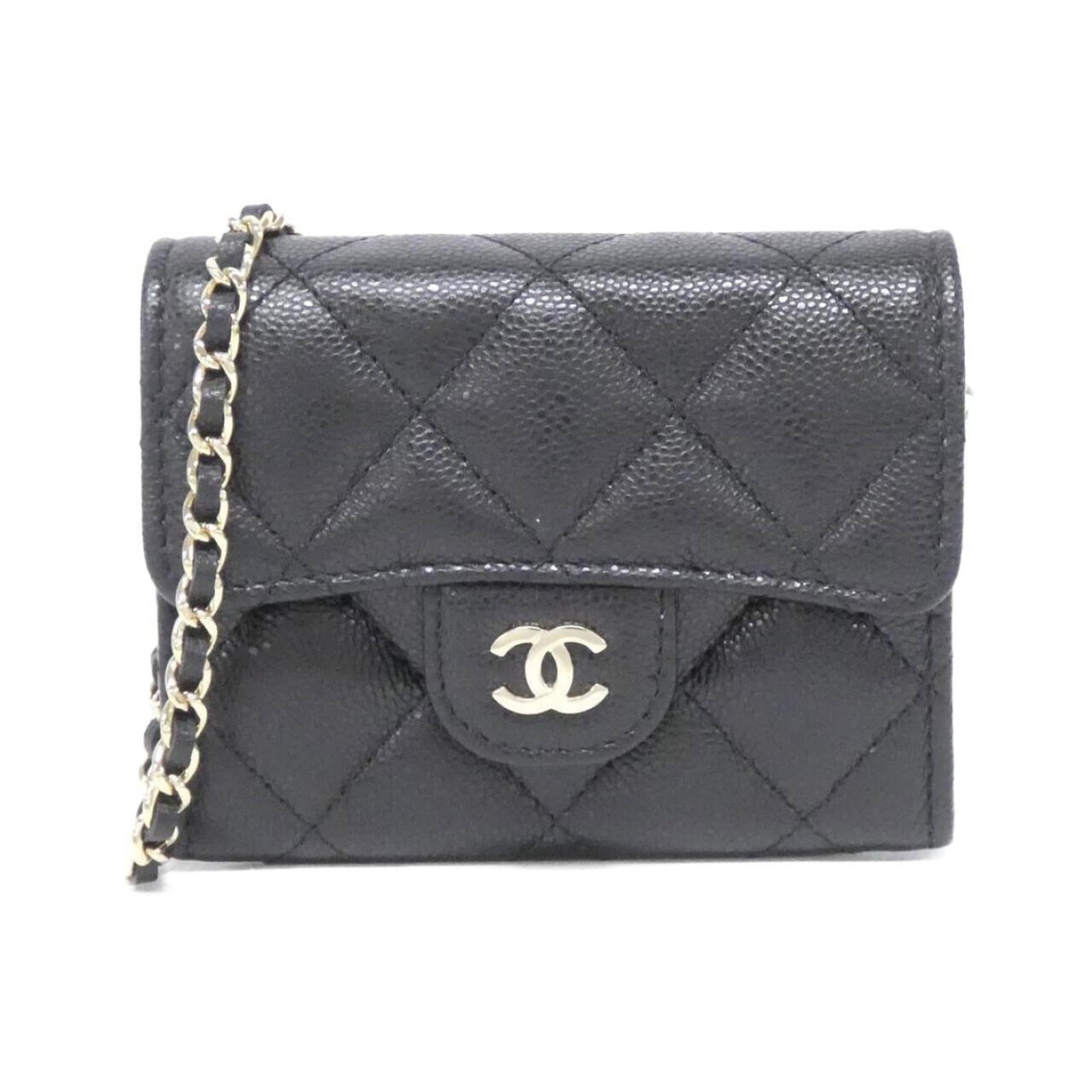Calfskin card case by Chanel: Calfskin card case by Chanel Grained Calfskin Card Case by Chanel - A sleek and sophisticated accessory, this card case features a classic black design made from high-quality Grained Calfskin. Measuri