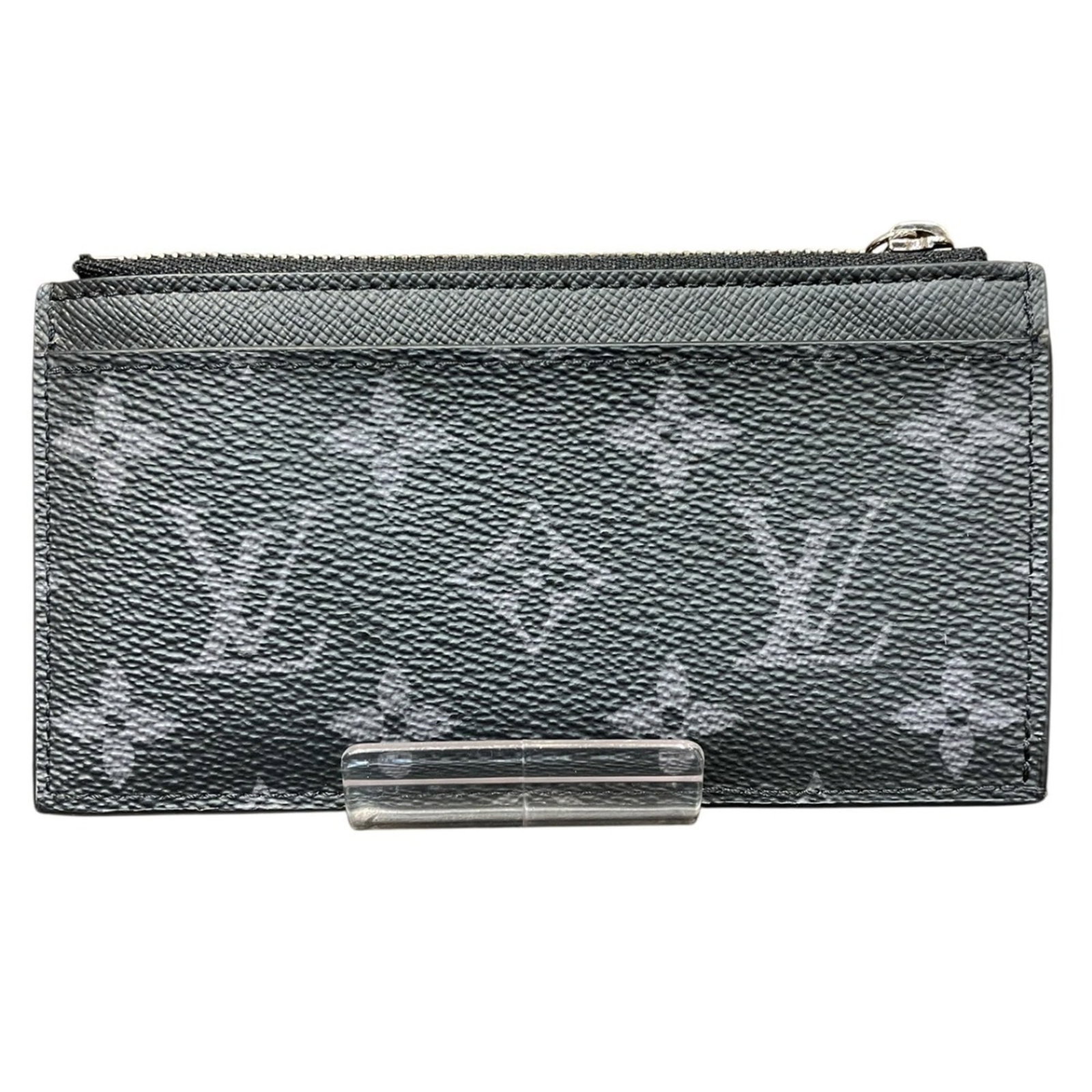 Louis Vuitton Louis Vuitton Wallet/ Coin Case Monogram Eclipse Reverse Leather M69533: Louis Vuitton Louis Vuitton Wallet/ Coin Case Monogram Eclipse Reverse Leather M69533 Black Louis Vuitton Wallet/ Coin Case Monogram Eclipse Reverse Leather features a sleek design with the iconic