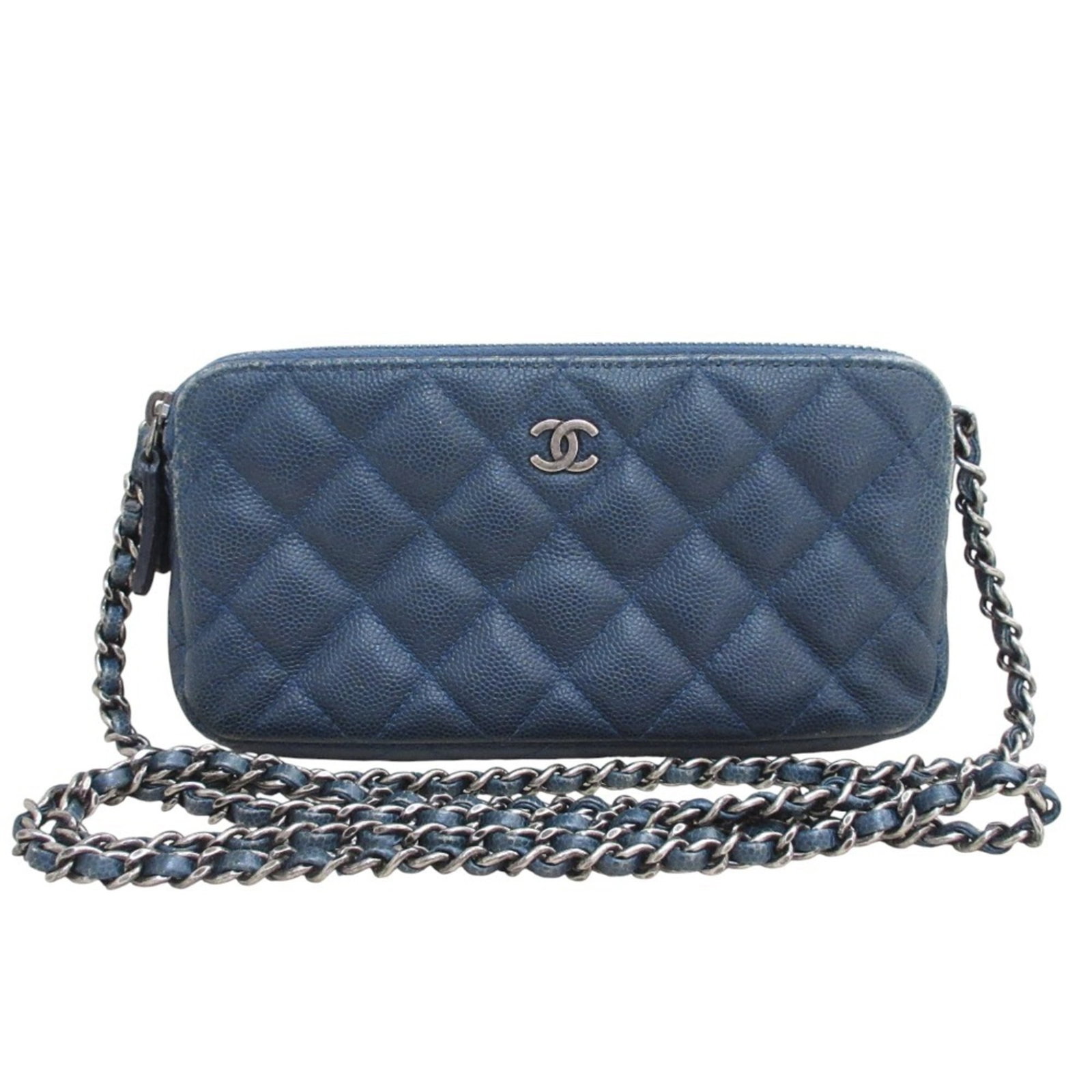 Calfskin Grained Chanel Bag: Calfskin Grained Chanel Bag Calfskin Grained Chanel Bag - A Timeless Navy Classic. This navy shoulder bag features high-quality grained calfskin material and a sleek, compact design. With its classic 