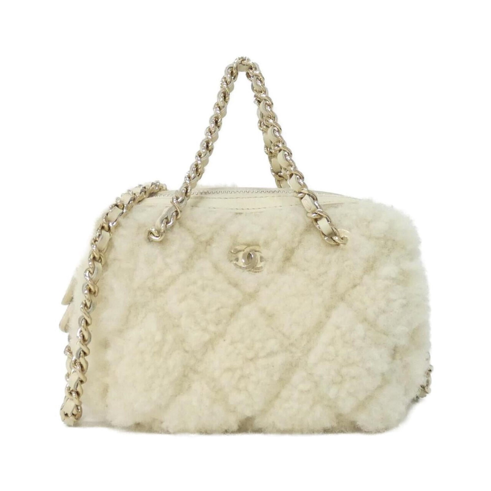 Shoulder Bag by Chanel: Shoulder Bag by Chanel The Chanel shoulder bag boasts an elegant ivory color and gold hardware, adding a touch of sophistication to any outfit. Measuring just 10cm x 13cm x 9cm, it's the perfect size 