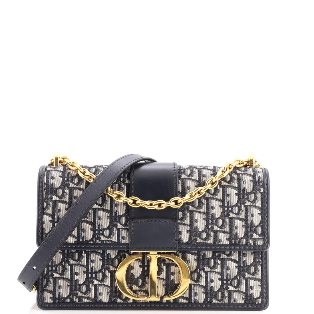 Chain flap bag canvas Oblique Christian Dior Montaigne: Chain flap bag canvas Oblique Christian Dior Montaigne Chain flap bag canvas Oblique Christian Dior Montaigne features a striking blue canvas exterior with gold hardware. The bag's oblique design and 
