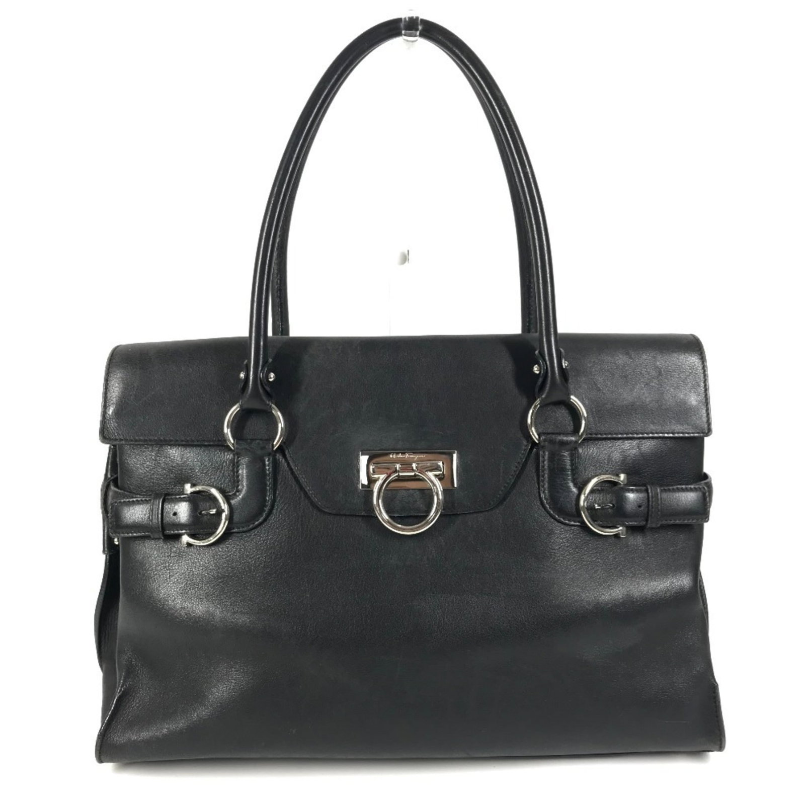 Salvatore Ferragamo Shoulder Bag Leather Tote: Salvatore Ferragamo Shoulder Bag Leather Tote Black leather shoulder bag tote from Salvatore Ferragamo, Italy. Measuring 22.5cm x 37cm x 11.5cm, it features high-quality leather construction and a cla