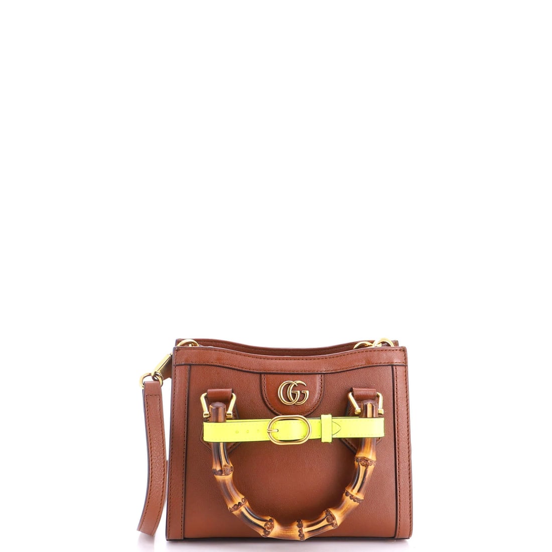 Leather Mini Handle Bamboo Gucci Tote Diana: Leather Mini Handle Bamboo Gucci Tote Diana This Gucci Leather Mini Handle Bamboo Tote features a classic cross body design with a brown leather exterior and neutral microfiber interior. The iconic ba