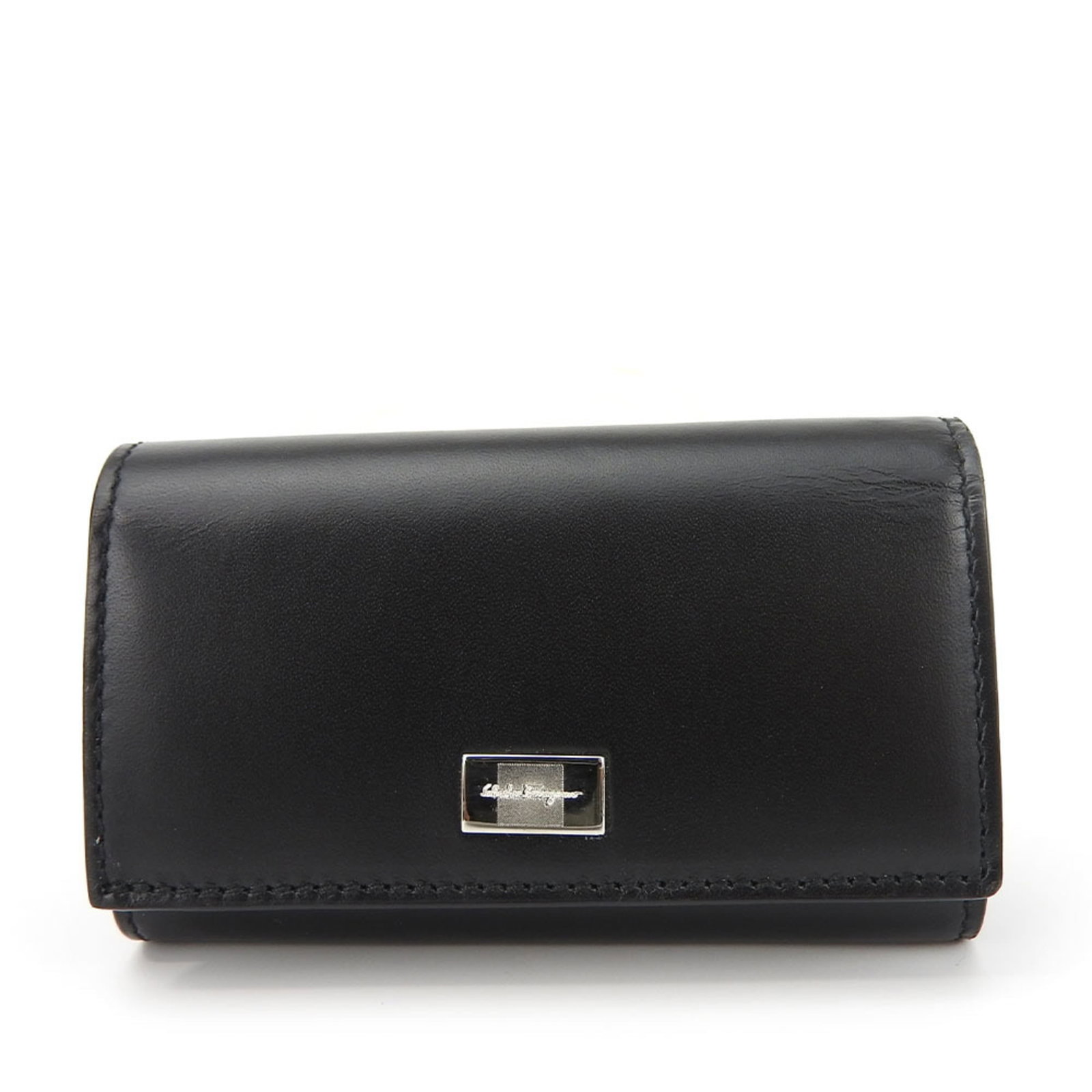 Salvatore Ferragamo Keycase Leather: Salvatore Ferragamo Keycase Leather Black and Brown Salvatore Ferragamo Keycase Leather. This sleek keycase features high-quality leather construction, measuring 6cm x 9.5cm x 2.5cm in size, and comes