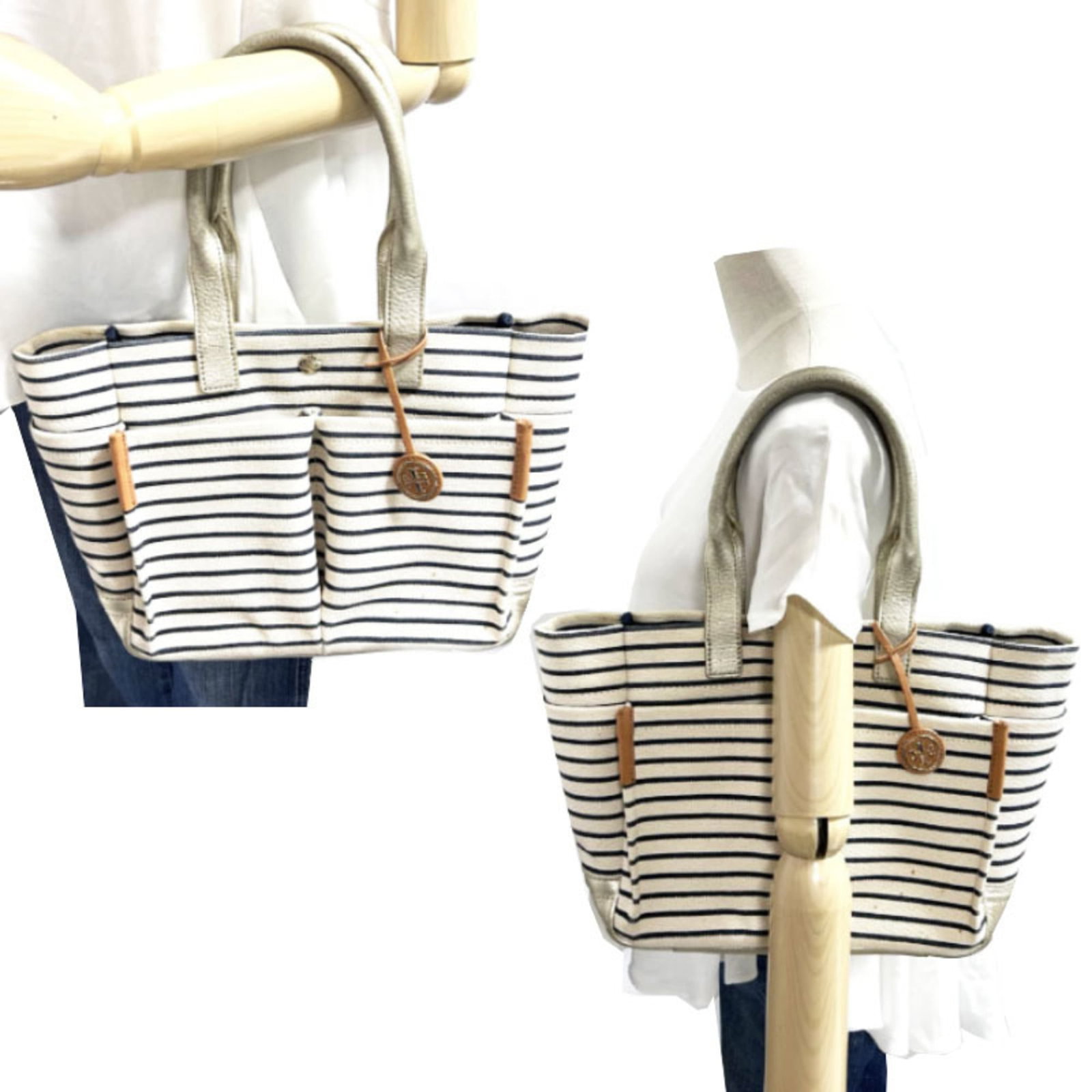 Canvas bag tote by Tory Burch: Canvas bag tote by Tory Burch Canvas bag tote by Tory Burch, featuring navy and white colors with gold hardware. Made from durable canvas and leather, this 23cm x 38cm tote measures 9.05'' x 14.96''