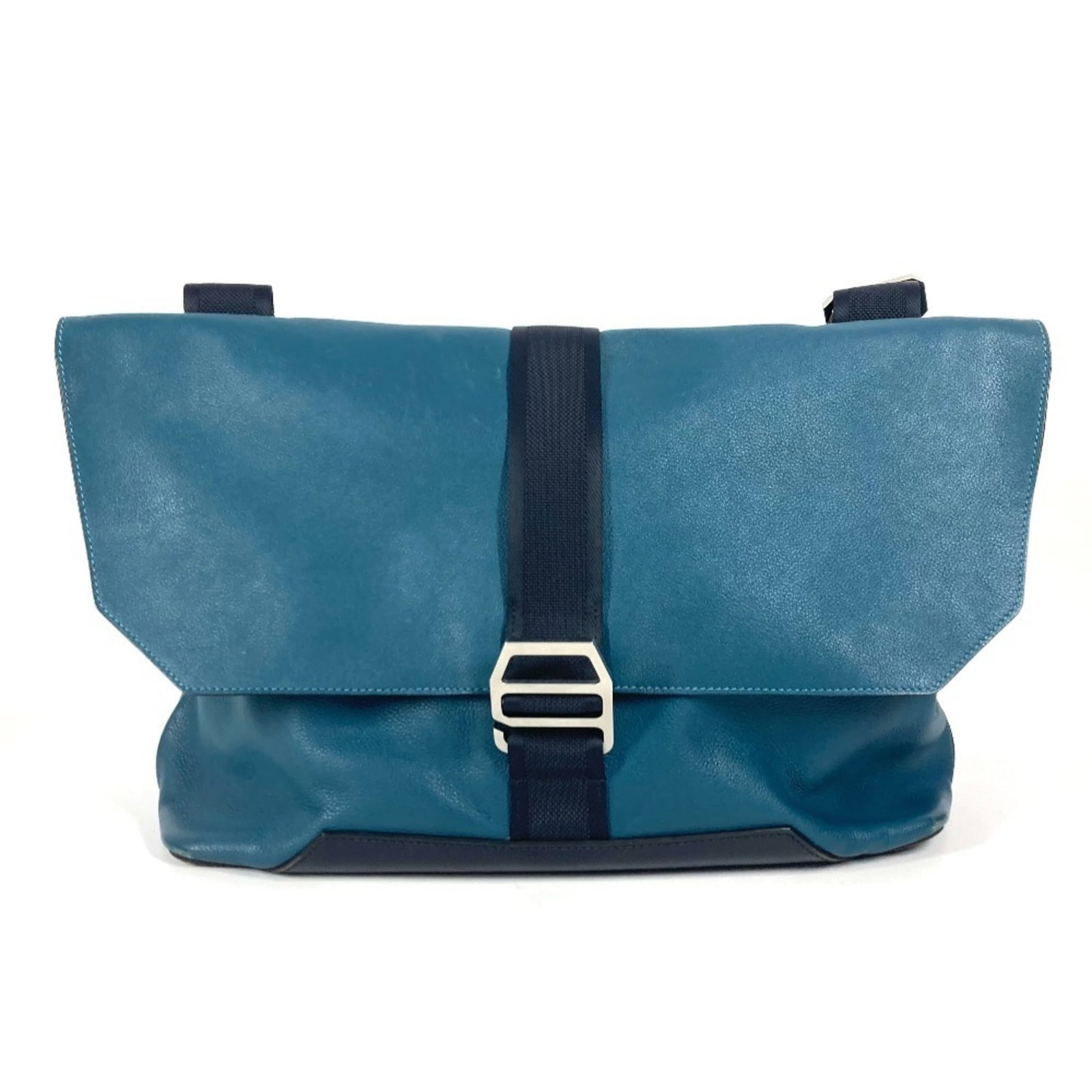 Hermes Messenger Leather Bag Shoulder: Hermes Messenger Leather Bag Shoulder Made from high-quality leather, this Hermes Messenger Leather Bag Shoulder boasts a classic design with clean lines and a timeless blue color. The bag's spacious