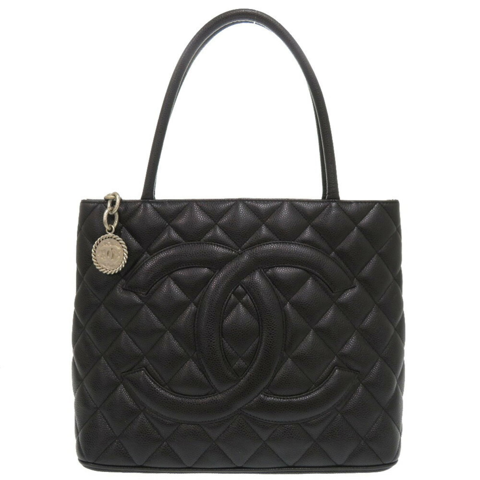 Calfskin bag tote by Chanel: Calfskin bag tote by Chanel Calfskin bag tote by Chanel, featuring grained Calfskin material and silver hardware, measures 25cm x 30cm x 15cm. Comes with a dust bag for added protection. This black
