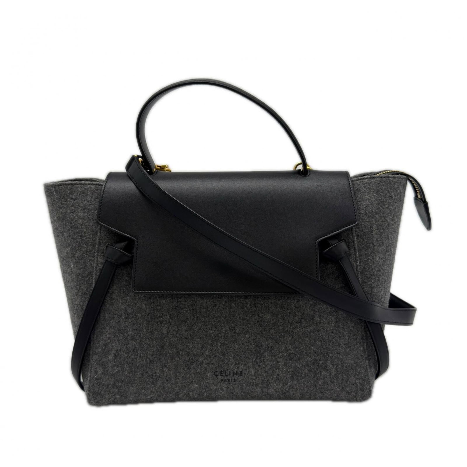 Celine leather handbag felt: Celine leather handbag felt The Celine leather handbag felt features a sleek black and gray color combination, with a flap closure and open pocket for added functionality. Its spacious interior includ