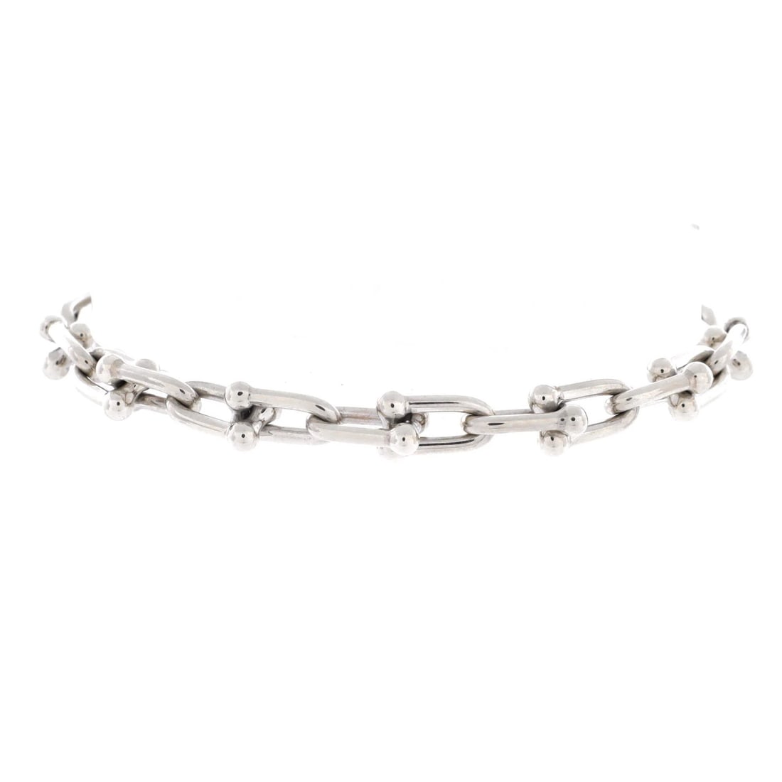 Sterling silver small link bracelet hardwear by Tiffany: Sterling silver small link bracelet hardwear by Tiffany Sterling silver small link bracelet by Tiffany & Co. features a classic hardwear design with intricate details and a timeless aesthetic. Made
