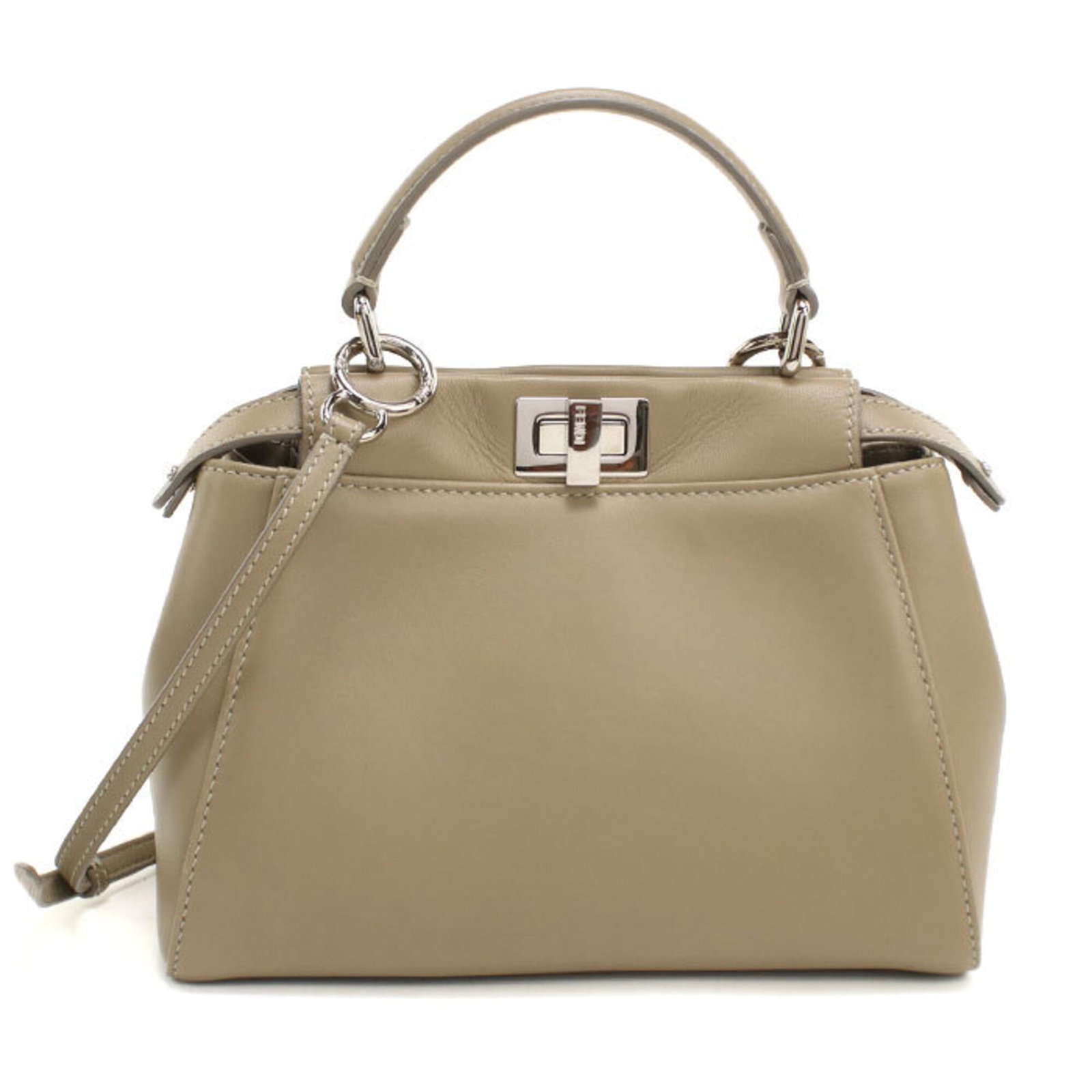 Fendi Handbag Leather: Fendi Handbag Leather Fendi Country of Origin: Italy, showcasing the brand's renowned craftsmanship and attention to detail. This exquisite beige calfskin handbag features high-quality silver hardware