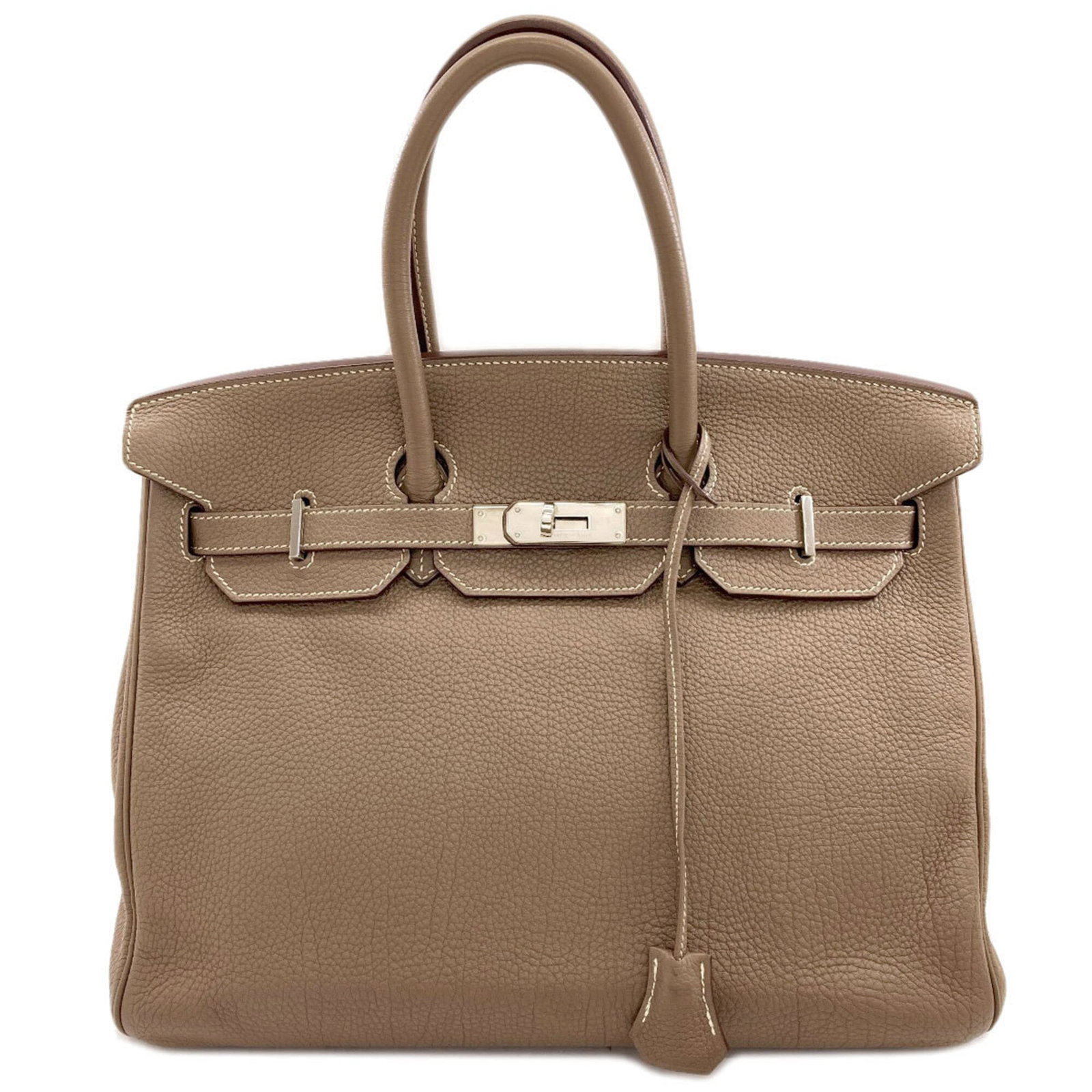 Togo Leather Handbag Hermes: Togo Leather Handbag Hermes Togo leather, a signature material for Hermes Birkin handbags, provides a rich and supple texture. The Etoupe gray color offers a sophisticated neutral tone, while the turn