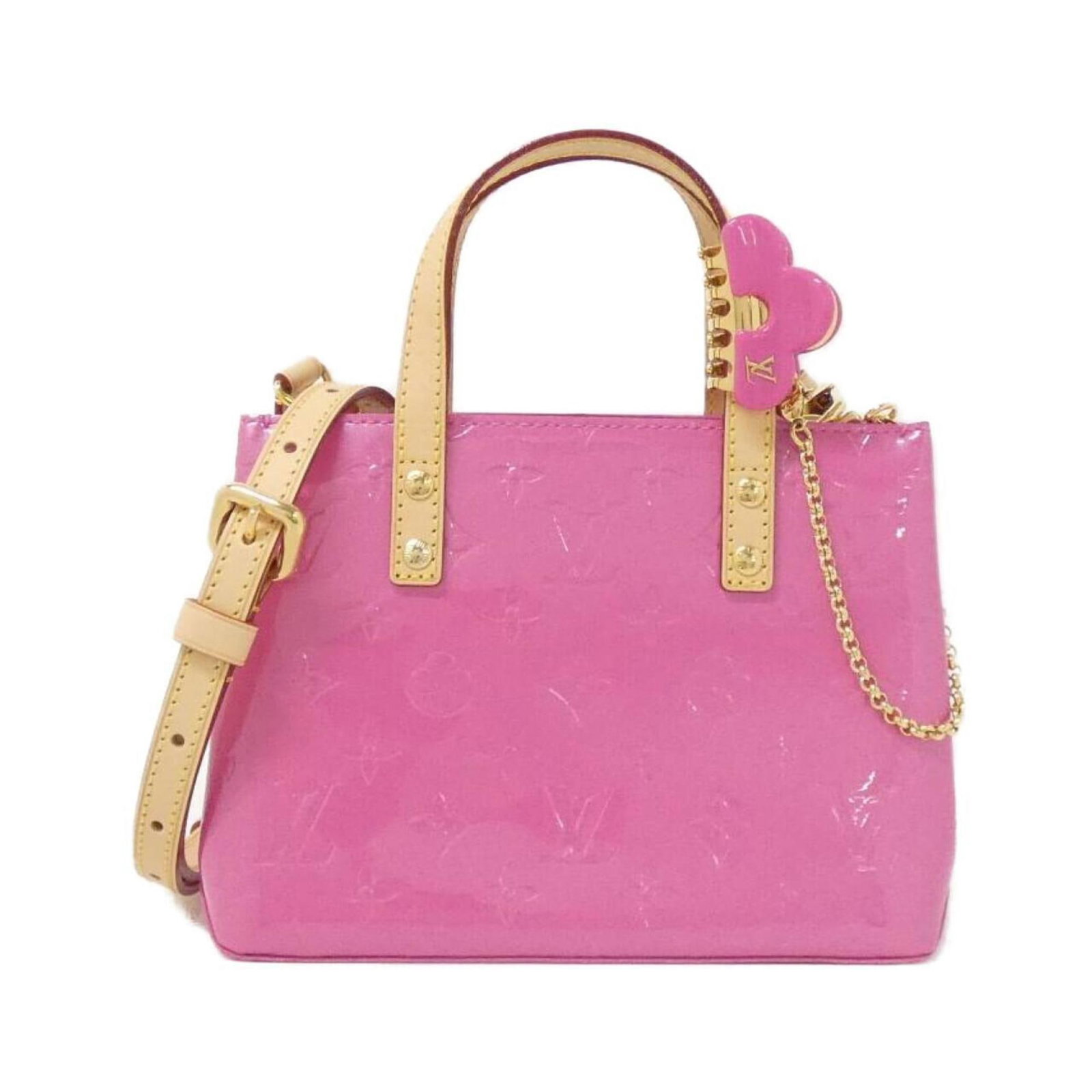 Louis Vuitton Handbag Leather: Louis Vuitton Handbag Leather The Louis Vuitton Handbag Leather is a stunning piece, featuring high-quality leather and gold hardware in a striking pink hue. This elegant handbag measures 16cm x 22cm
