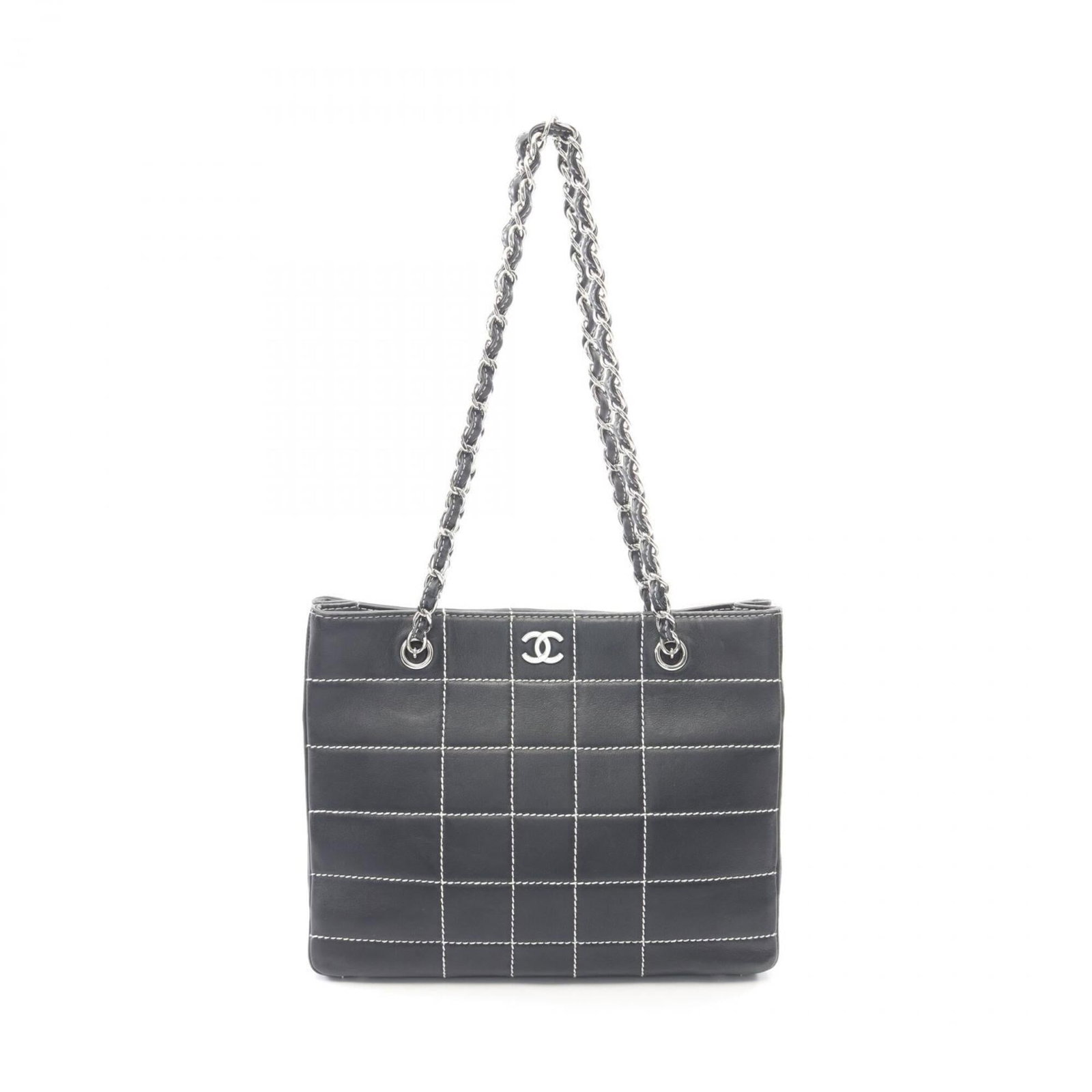 Handbag tote leather bag Chanel: Handbag tote leather bag Chanel Navy leather Chanel handbag tote with classic design and timeless style. Made from high-quality leather, this bag features clean lines and a spacious interior perfect