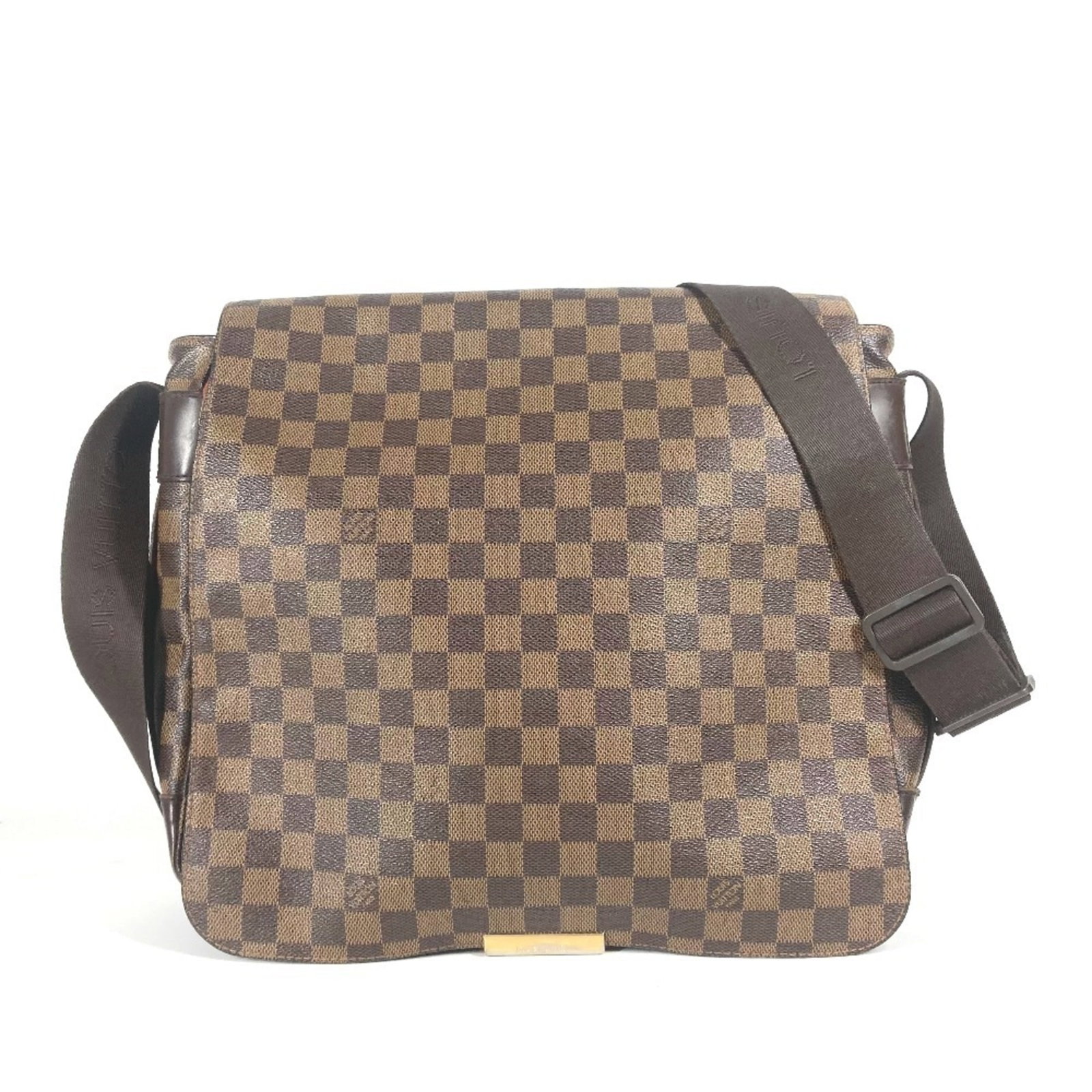 Shoulder Bag Damier Canvas by Louis Vuitton: Shoulder Bag Damier Canvas by Louis Vuitton Damier Canvas by Louis Vuitton, a classic shoulder bag in brown Damier Canvas. This iconic design features the signature pattern and timeless style that