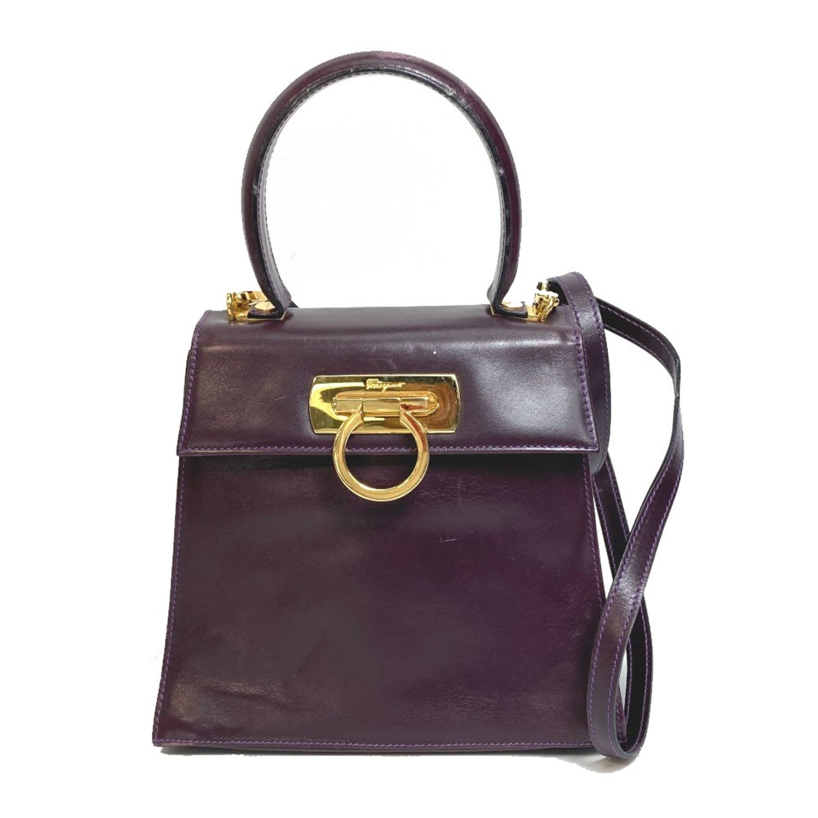 Salvatore Ferragamo Handbag Leather: Salvatore Ferragamo Handbag Leather Purple Salvatore Ferragamo Handbag, measuring 18cm x20cm x7.5cm/7.9x3.0W20cmxH18cmxD7.5cm/W7.9xH7.1xD3.0inch, is a luxurious leather handbag with rich purple hue.
