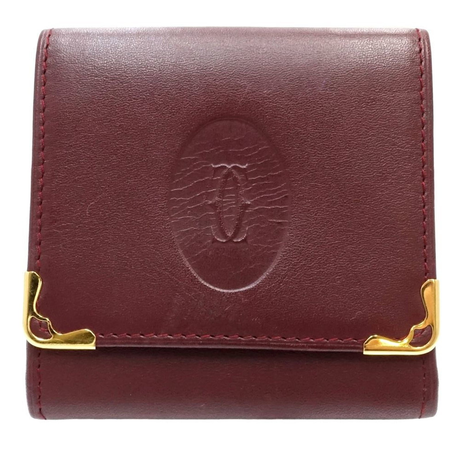 Cartier Coin Purse/ Coin Case Leather: Cartier Coin Purse/ Coin Case Leather Bordeaux leather Cartier coin purse/coin case, measuring 8cm x 8.5cm x 1cm in size, offers a sleek and elegant storage solution for small essentials. This