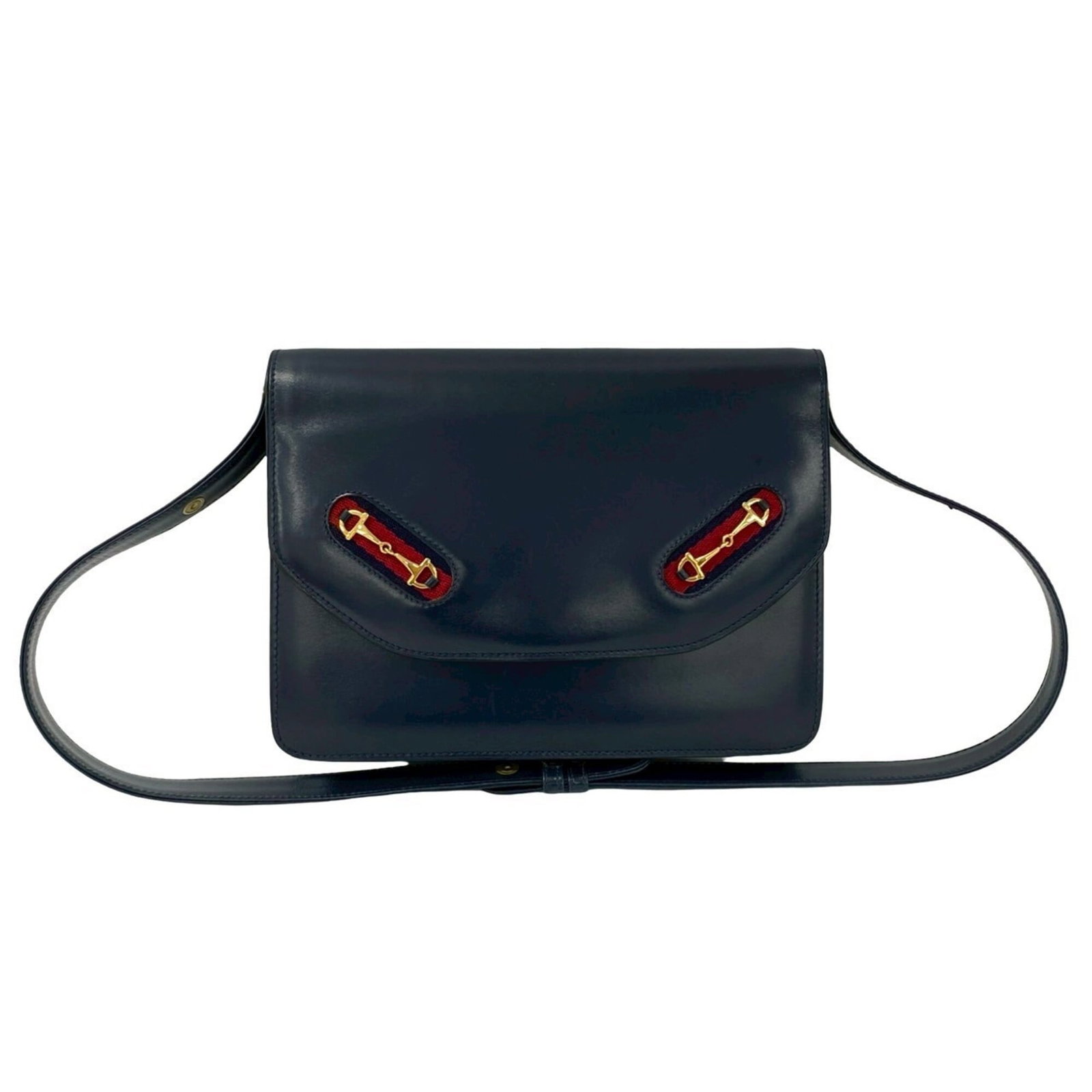 Gucci Shoulder Bag Leather: Gucci Shoulder Bag Leather Navy and red leather shoulder bag from Gucci, measuring 17cm x 23cm x 8.5cm. This classic design combines timeless style with a sleek, modern silhouette. The bag's navy and