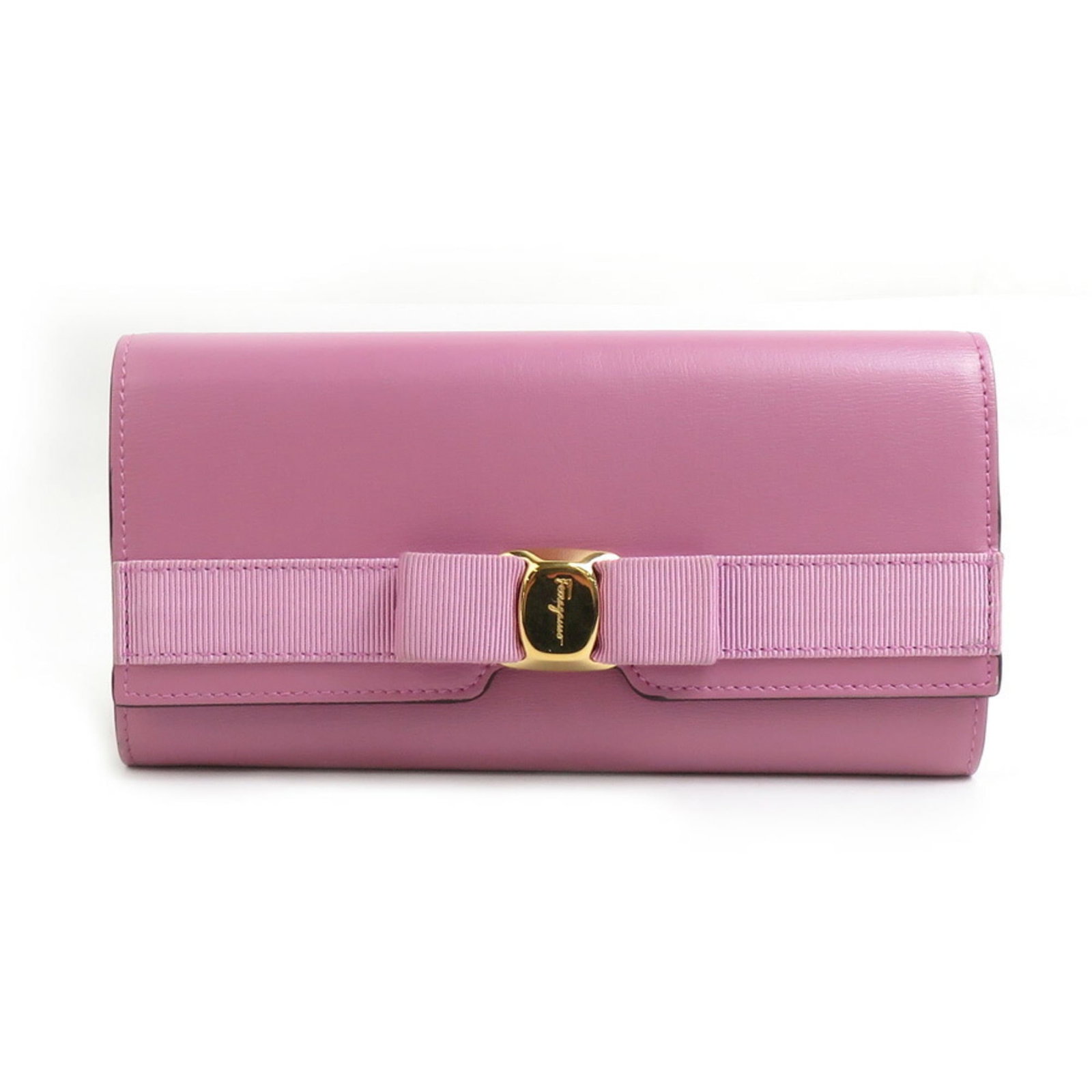 Salvatore Ferragamo Long Wallet (Tri-Fold) Leather: Salvatore Ferragamo Long Wallet (Tri-Fold) Leather Salvatore Ferragamo's tri-fold leather wallet boasts a rich purple hue, measuring 9.5cm x 18.7cm x 3cm in size. Made from high-quality leather, this 