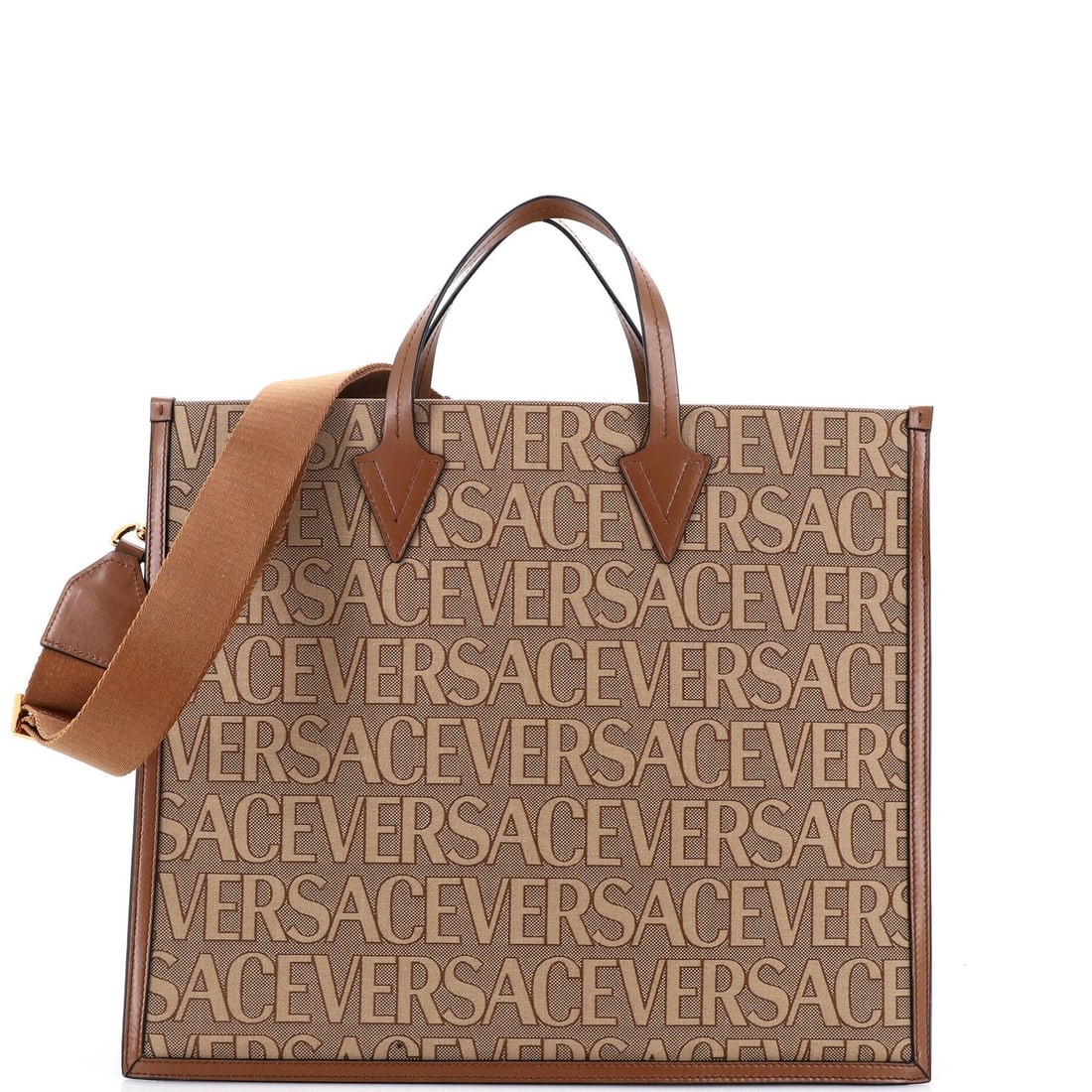 Versace logo allover large canvas convertible tote printed: Versace logo allover large canvas convertible tote printed Brown Versace logo allover large canvas convertible tote with neutral interior, featuring holes on base corners and heavy cracking