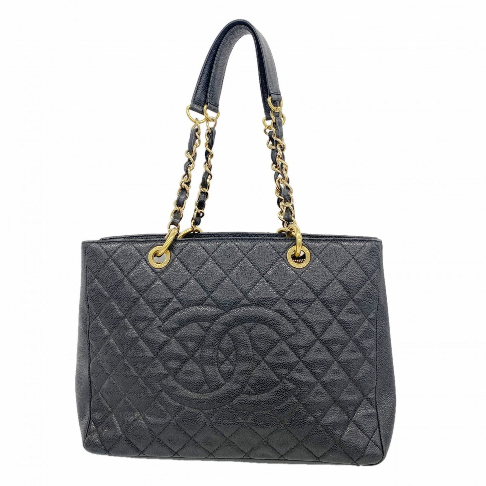 Calfskin bag tote by Chanel: Calfskin bag tote by Chanel Calfskin bag tote by Chanel in black features gold hardware, with dimensions of 24cm x 33cm x 12.5cm. This classic design showcases the luxurious feel of grained calfskin,