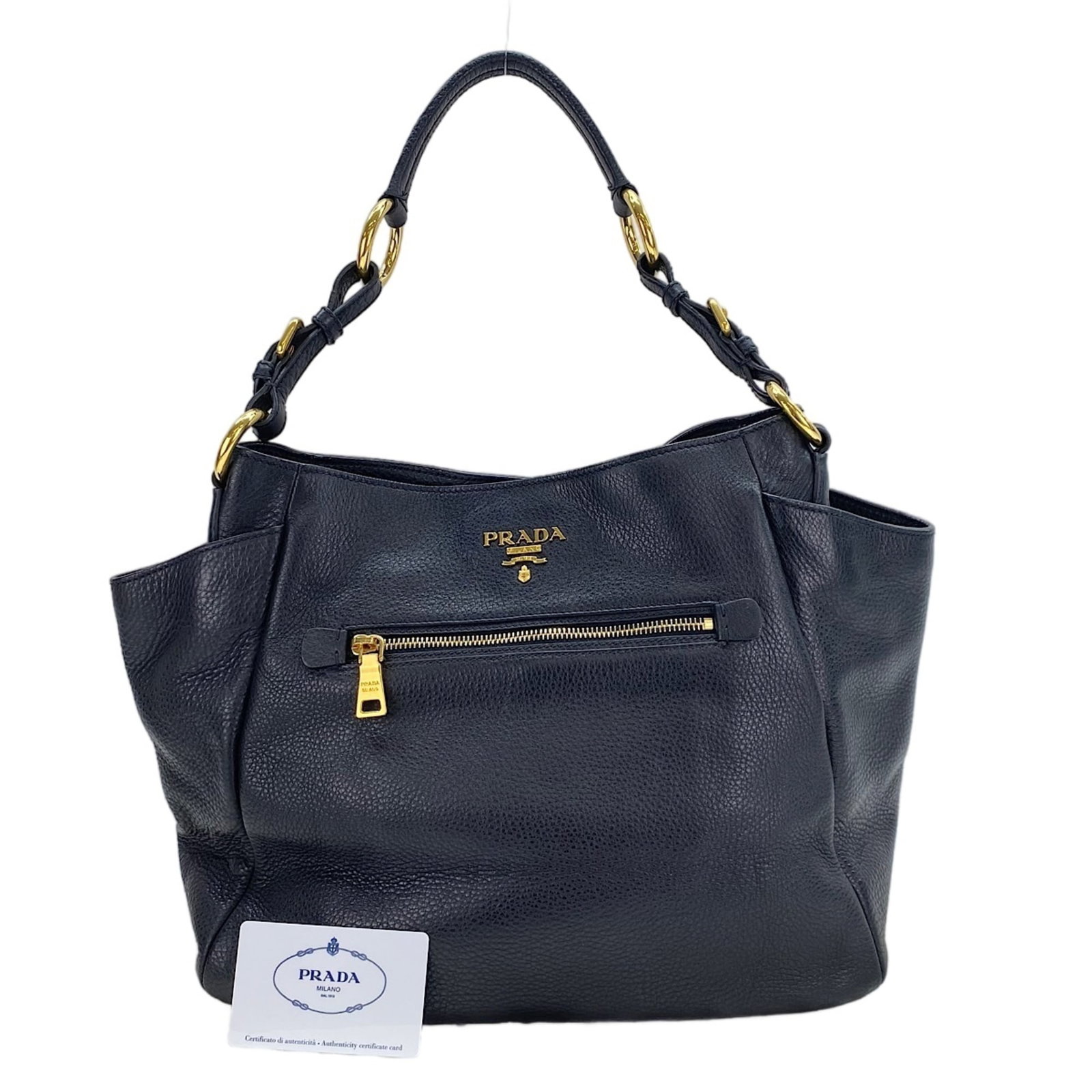 Shoulder Bag: Shoulder Bag The Prada MPN shoulder bag boasts sleek black design with precise measurements, standing at 28cm x 33cm x 16cm. Its compact size and durable construction make it a practical choice for da