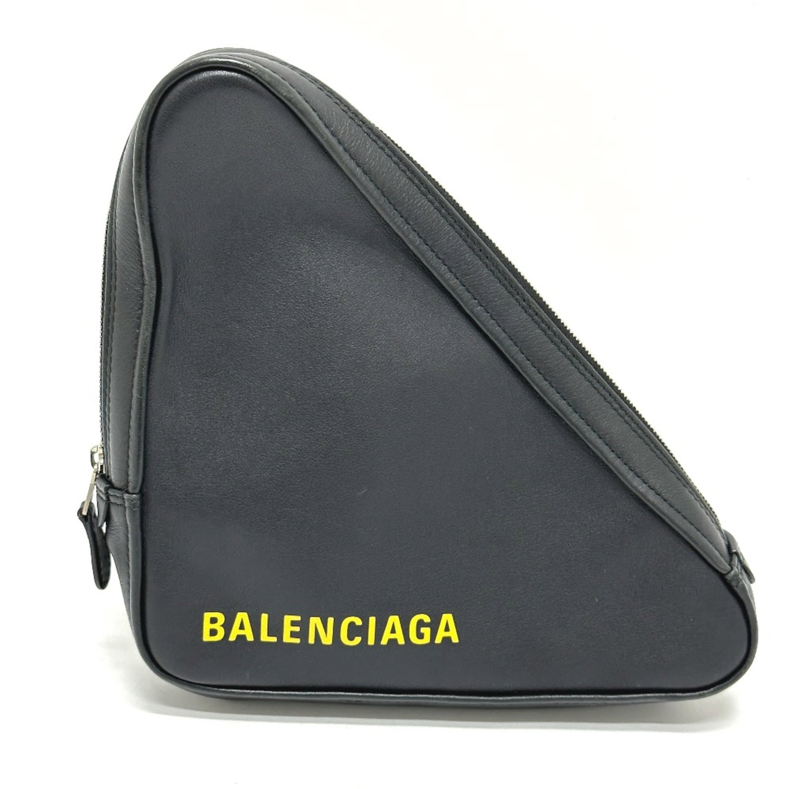 Balenciaga Pouch Leather: Balenciaga Pouch Leather This Balenciaga Pouch Leather is made from high-quality leather, offering a sleek and sophisticated design. The black color provides a versatile canvas for various styling
