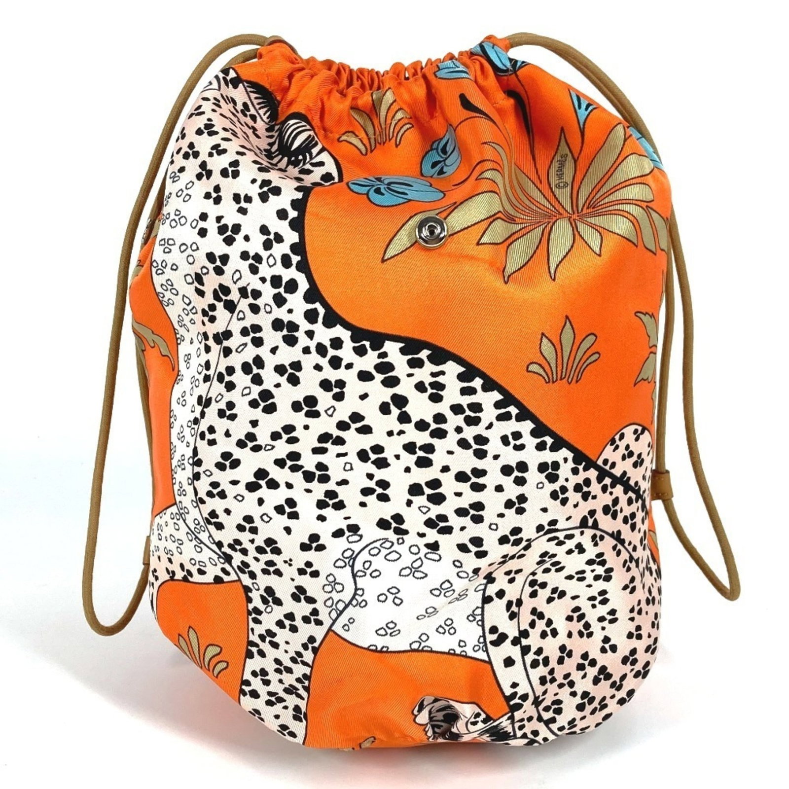Hermes Pouch: Hermes Pouch Silk pouch from the renowned French fashion house Hermes, crafted in vibrant orange. Measuring 27cm x 27cm, this compact pouch exudes elegance and sophistication. Its understated design m