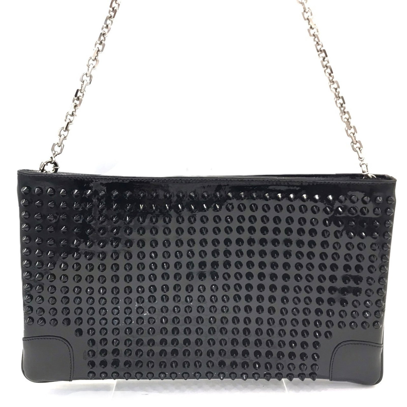 Christian Louboutin Leather Shoulder Bag: Christian Louboutin Leather Shoulder Bag Black leather shoulder bag with an enamel finish, measuring 18cm x 31.5cm and featuring a 61cm long strap. The bag's sleek design showcases its luxurious