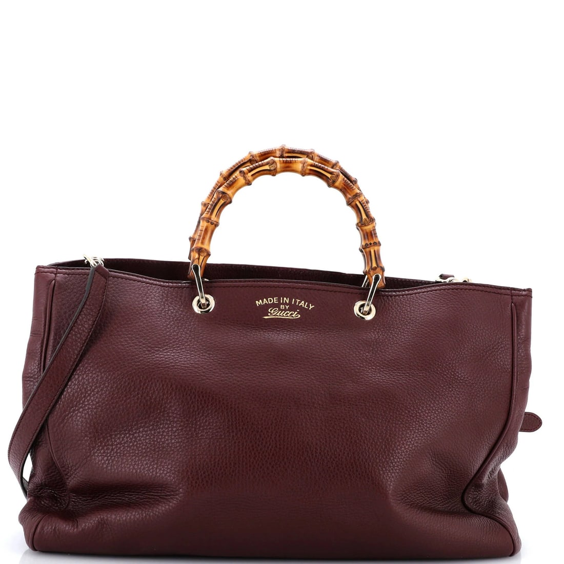 Gucci Bamboo Shopper Tote Leather Large: Gucci Bamboo Shopper Tote Leather Large Burgundy Gucci Bamboo Shopper Tote Leather Large in Good Condition. This large tote features heavy corner wear, scuffs, edge wear, minor creases, and minor crac