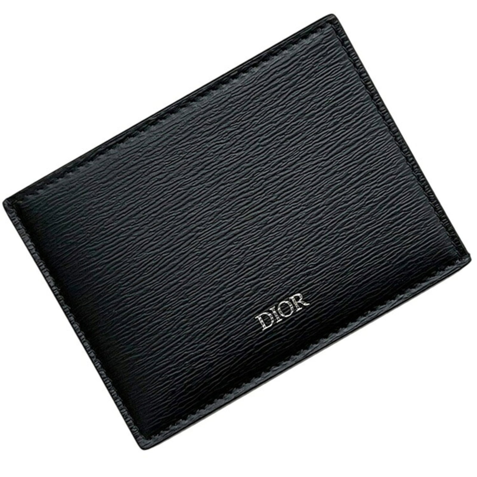 Christian Dior Card Leather Case: Christian Dior Card Leather Case The Christian Dior Card Leather Case boasts sleek, sophisticated design in black leather. Its compact size and subtle elegance make it an ideal accessory for everyday 