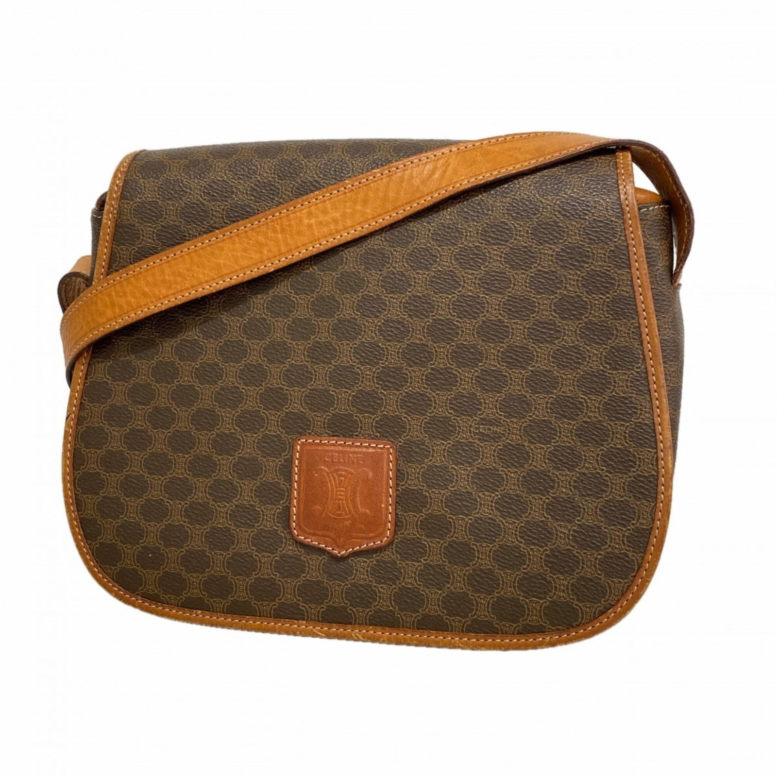 PVC Celine Bag Shoulder: PVC Celine Bag Shoulder The Celine PVC shoulder bag features a sleek, brown design with gold hardware. With its compact size and durable PVC material, it's perfect for everyday use. Its signature shap