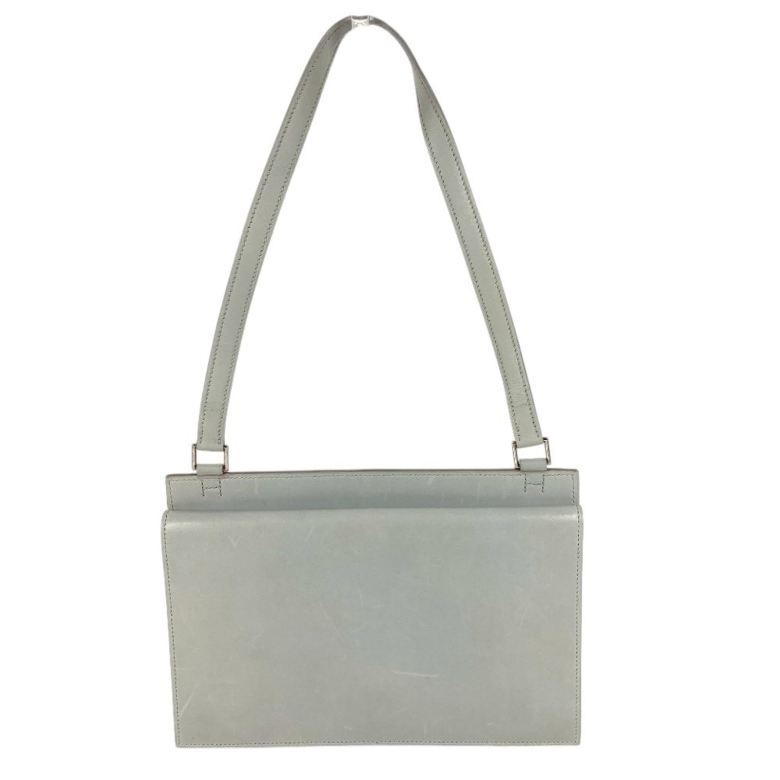Shoulder bag leather by Hermes: Shoulder bag leather by Hermes Light blue leather shoulder bag by Hermes, measuring 17cm x 24.5cm x 6cm, features high-quality craftsmanship and a classic design. Made from genuine leather, this