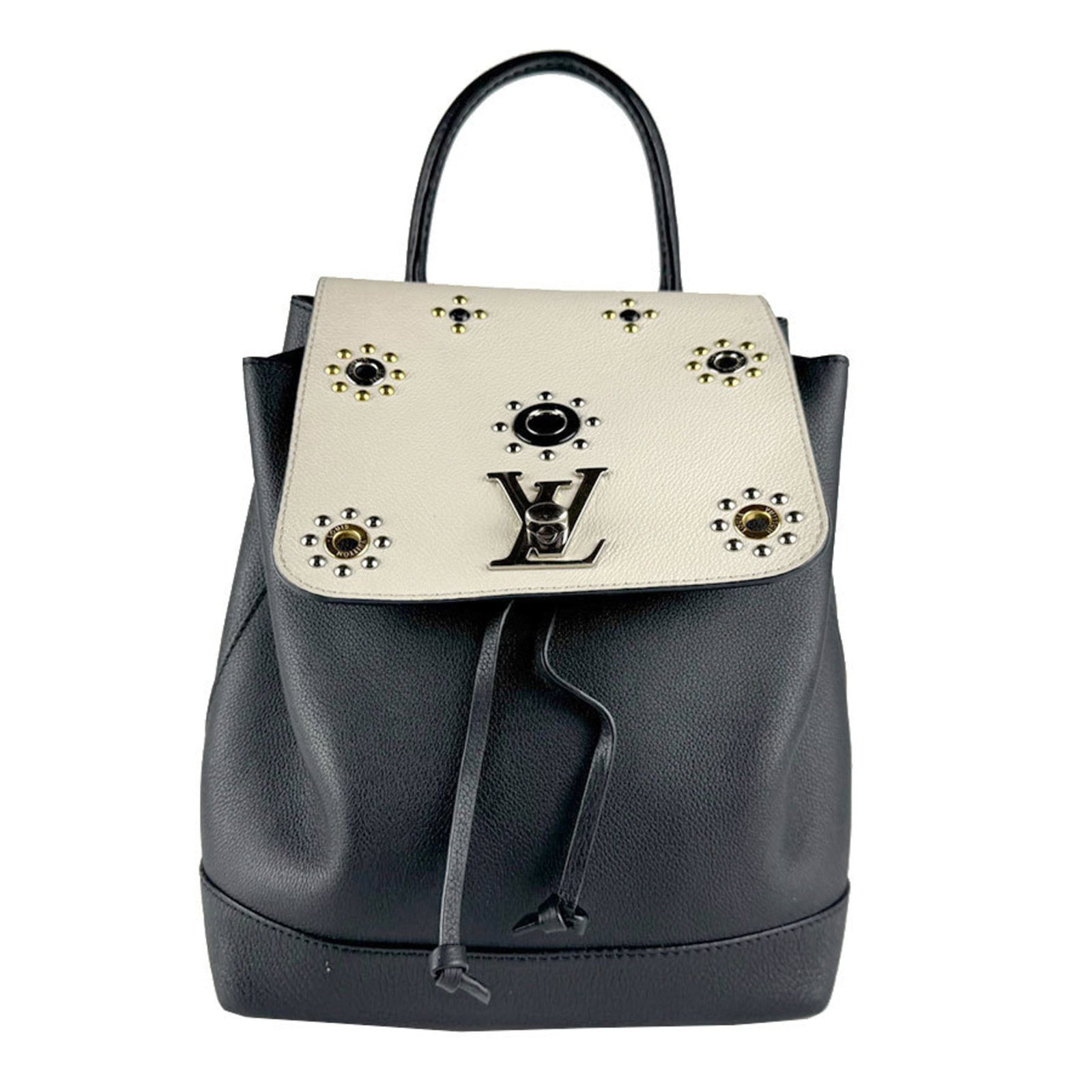 Leather Louis Vuitton Backpack: Leather Louis Vuitton Backpack Black and off-white leather Louis Vuitton backpack with classic design, measuring 23cm x 21cm x 13cm. Made from high-quality leather, this stylish bag features a