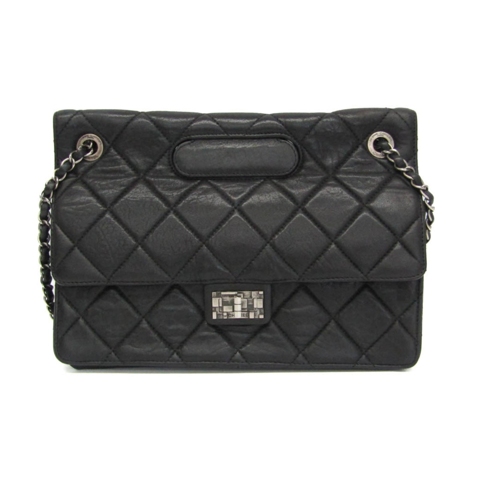 Chanel Handbag Shoulder Bag Leather: Chanel Handbag Shoulder Bag Leather Black lambskin leather Chanel 2.55 Chain shoulder bag with turn lock closure and magnet pocket, measuring 22cm x 30cm x 7cm, weighing 740g. This classic design