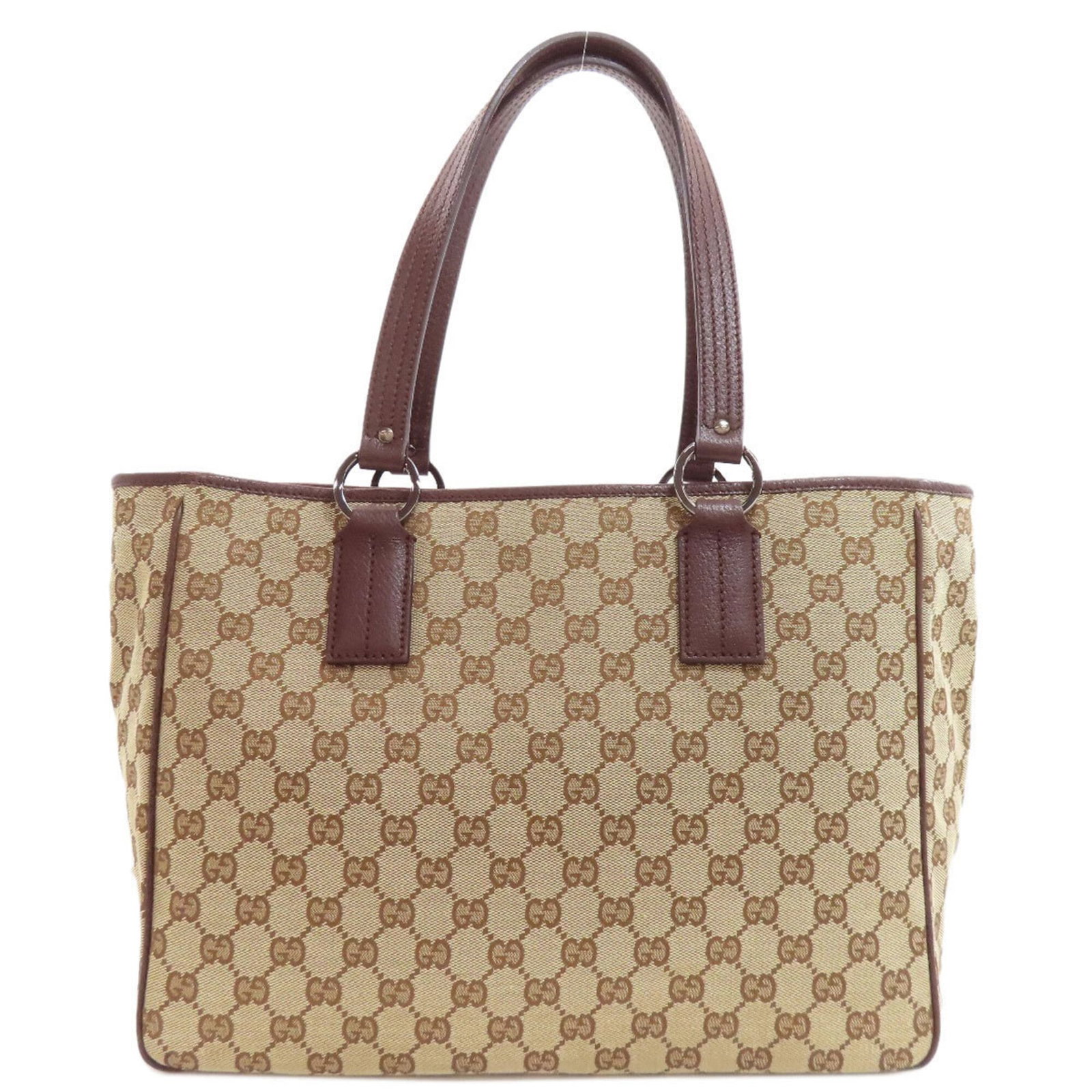 Gucci Tote Bag Canvas: Gucci Tote Bag Canvas Canvas tote bag from Gucci, featuring a brown color and dimensions of 25cm x 42cm x 12cm. The bag's canvas material provides a sturdy and classic design that can be easily carrie