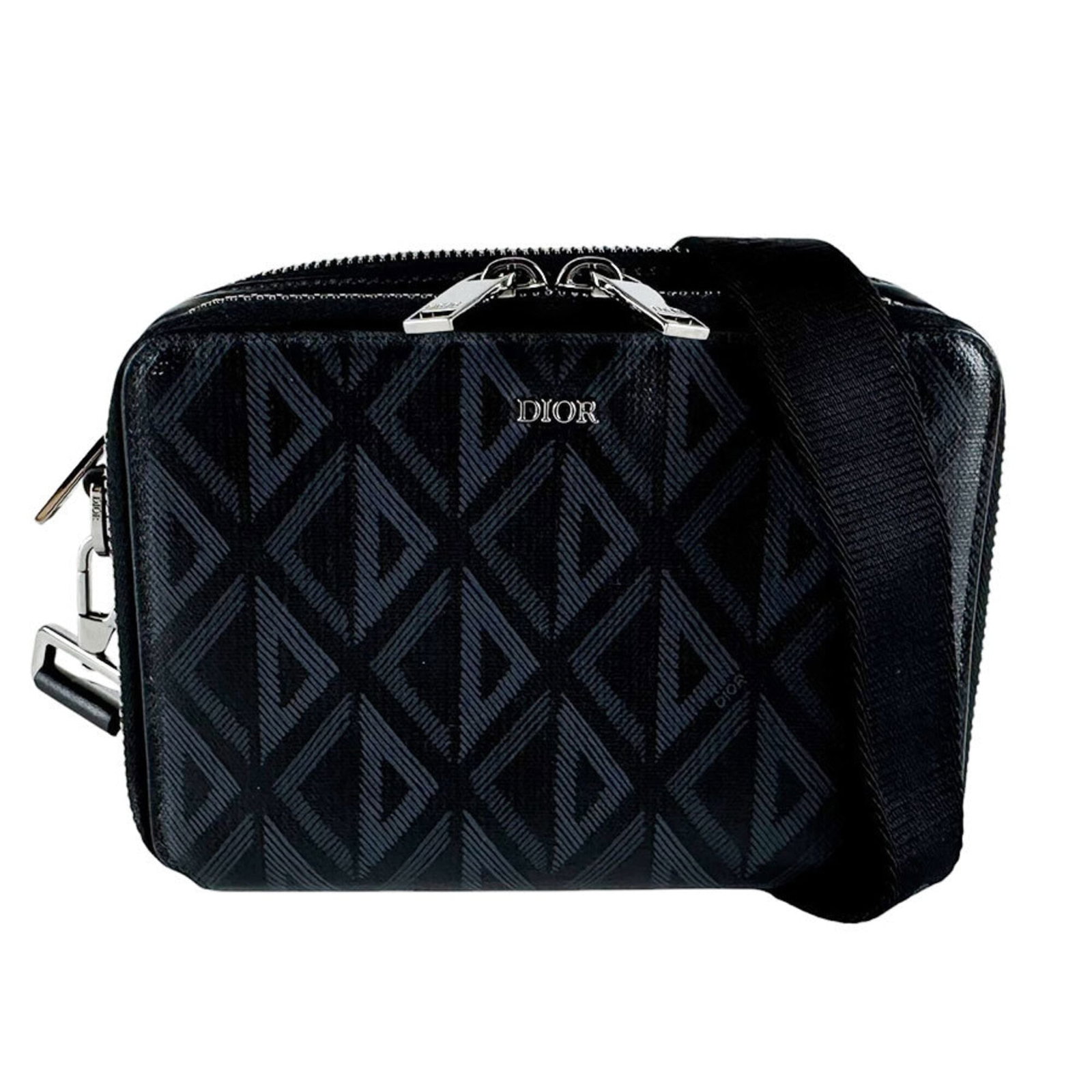 Shoulder Bag Canvas Coated by Christian Dior: Shoulder Bag Canvas Coated by Christian Dior Christian Dior's shoulder bag boasts a sleek, coated canvas design in black. Measuring 13cm x 18cm x 5cm, it offers a compact and stylish solution for