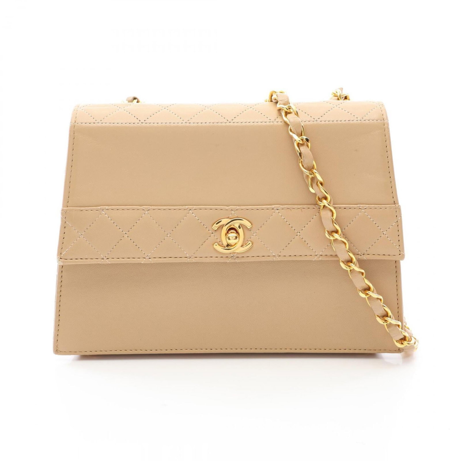 Chanel Handbag Shoulder Bag Leather: Chanel Handbag Shoulder Bag Leather This exquisite Chanel Handbag Shoulder Bag is crafted from luxurious lambskin leather in a beautiful beige hue. The bag's sleek design and gold hardware add to its