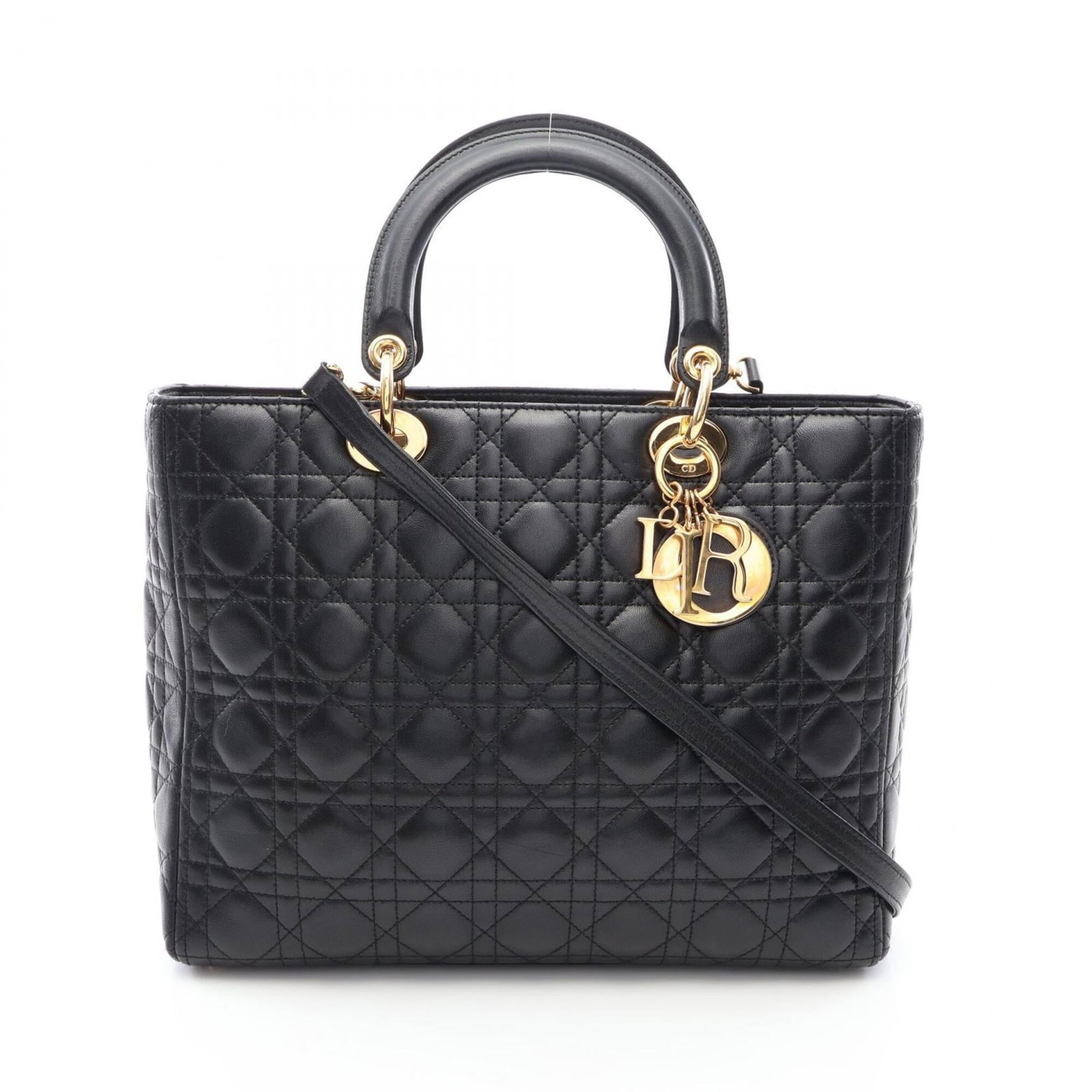 Handbag Christian Dior Leather: Handbag Christian Dior Leather Black Christian Dior leather handbag with dimensions 25cm x 32cm x 11cm. Made from high-quality leather, this classic design features a timeless silhouette and clean