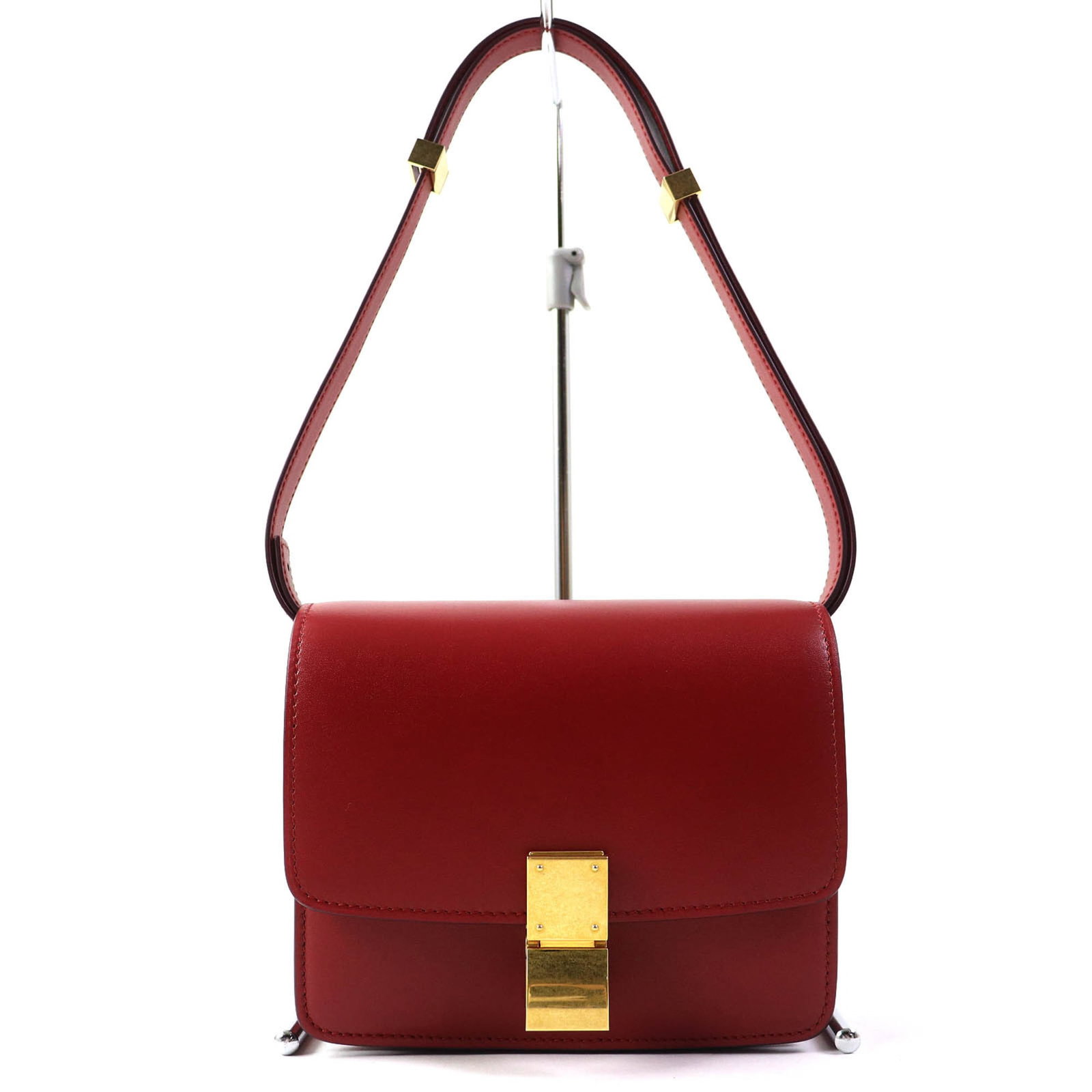 Celine bag leather: Celine bag leather Red leather Celine shoulder bag with gold hardware and zipper pocket, presented in its original box and dust bag. Measuring 14cm x 17cm x 7cm, it features a flap closure and
