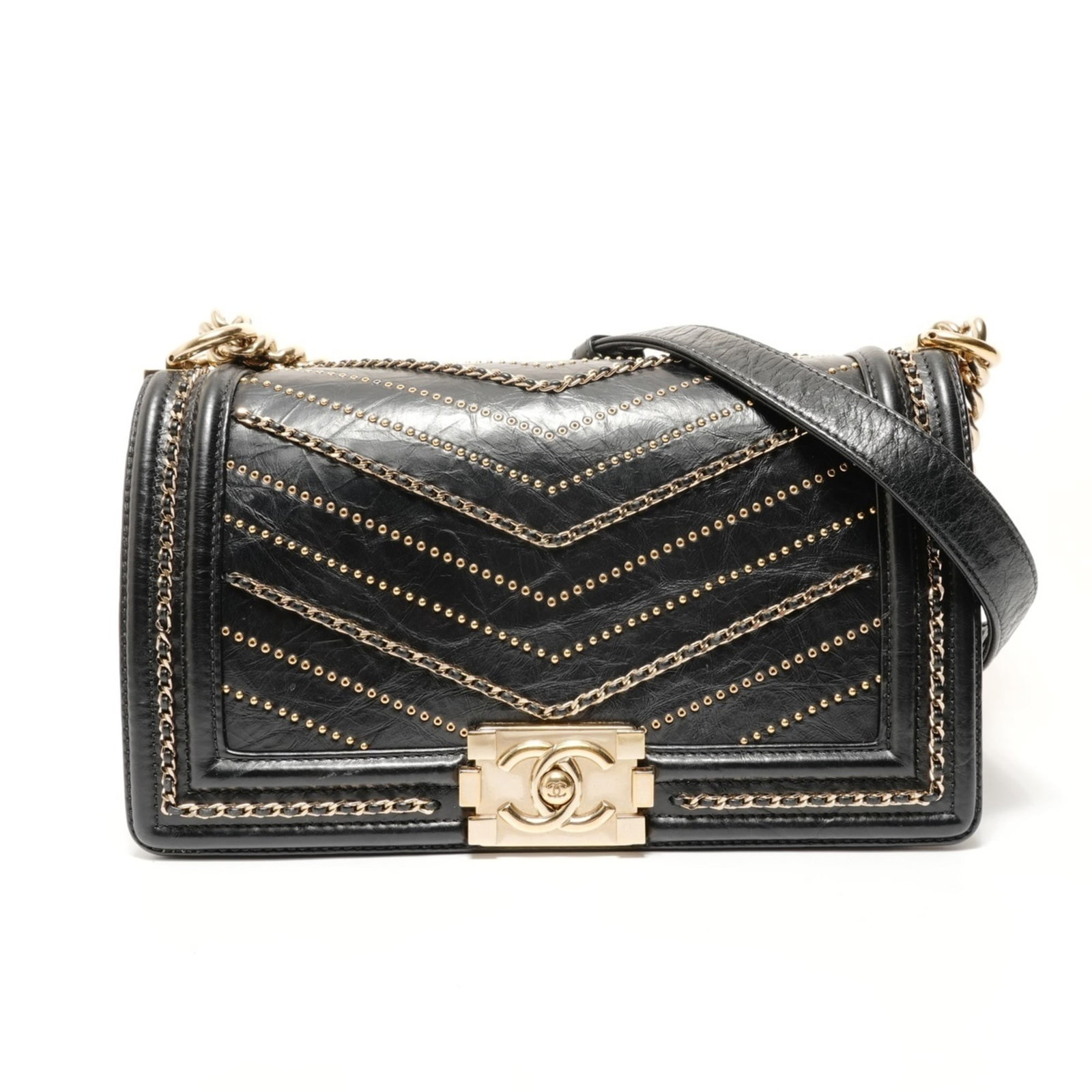 Shoulder Bag by Chanel: Shoulder Bag by Chanel Black Boy Chanel shoulder bag with a sleek design and adjustable strap length. Measuring 16cm x 24.5cm x 7cm, it offers a compact yet stylish storage solution. The bag's simple