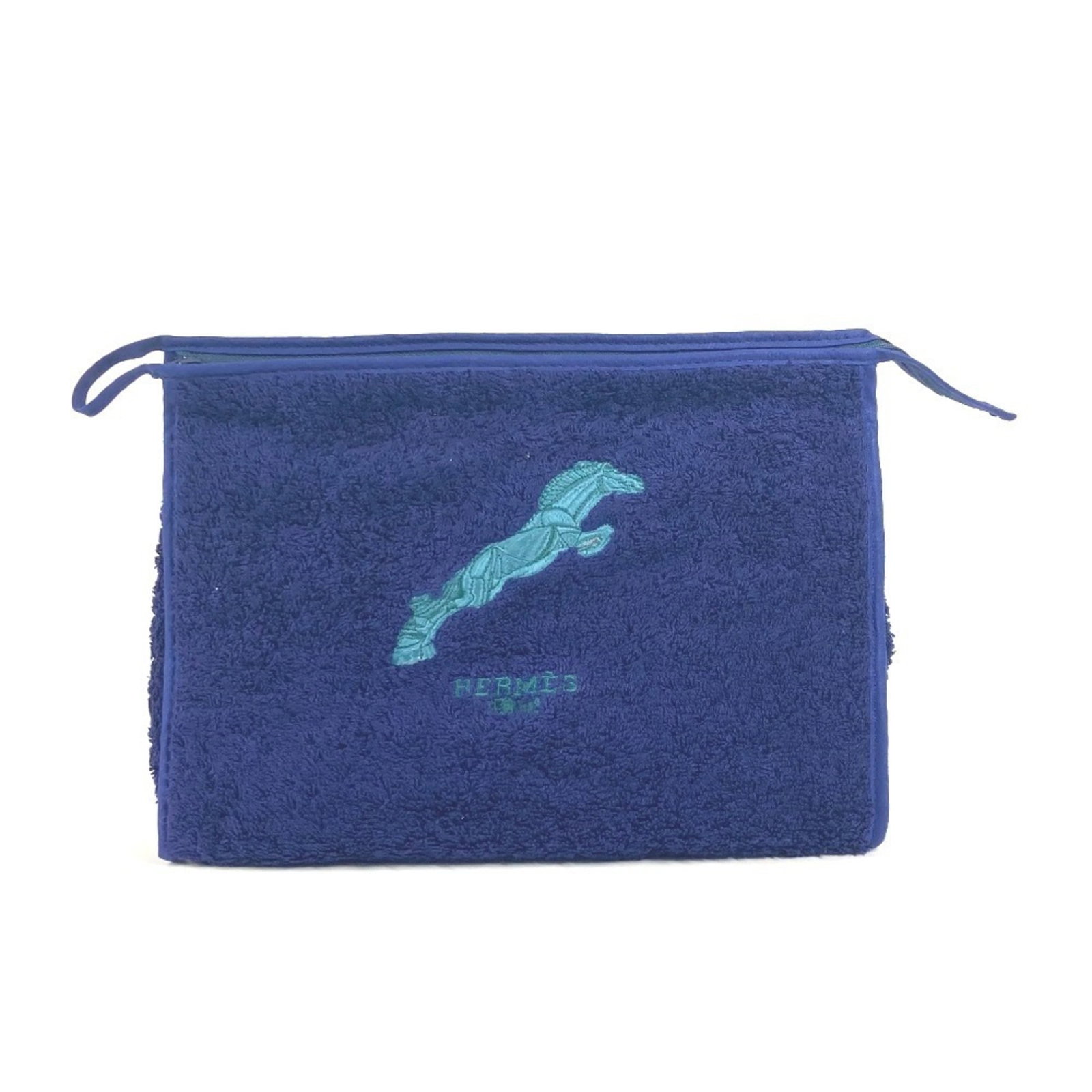 Clutch bag by fabric pile pouch: Clutch bag by fabric pile pouch Navy pile fabric clutch bag with a compact size of 19.5cm x 28cm, making it a convenient accessory for evening events. The simple design and understated color make it a